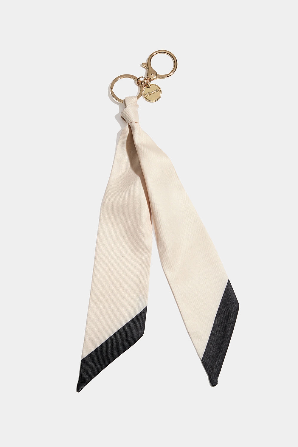 Laukkukoriste beigen värisellä huivilla ryhmässä Store week / @ Glitter (177000808600)