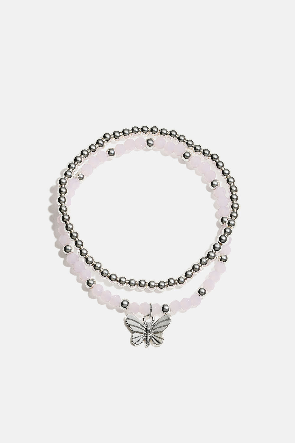 Joustavat rannekorut, joissa perhonen ja vaaleanpunaisia ja hopeanvärisiä helmiä, 2 kpl ryhmässä Korut / Rannekorut / Monipakkaus @ Glitter (251001971001)