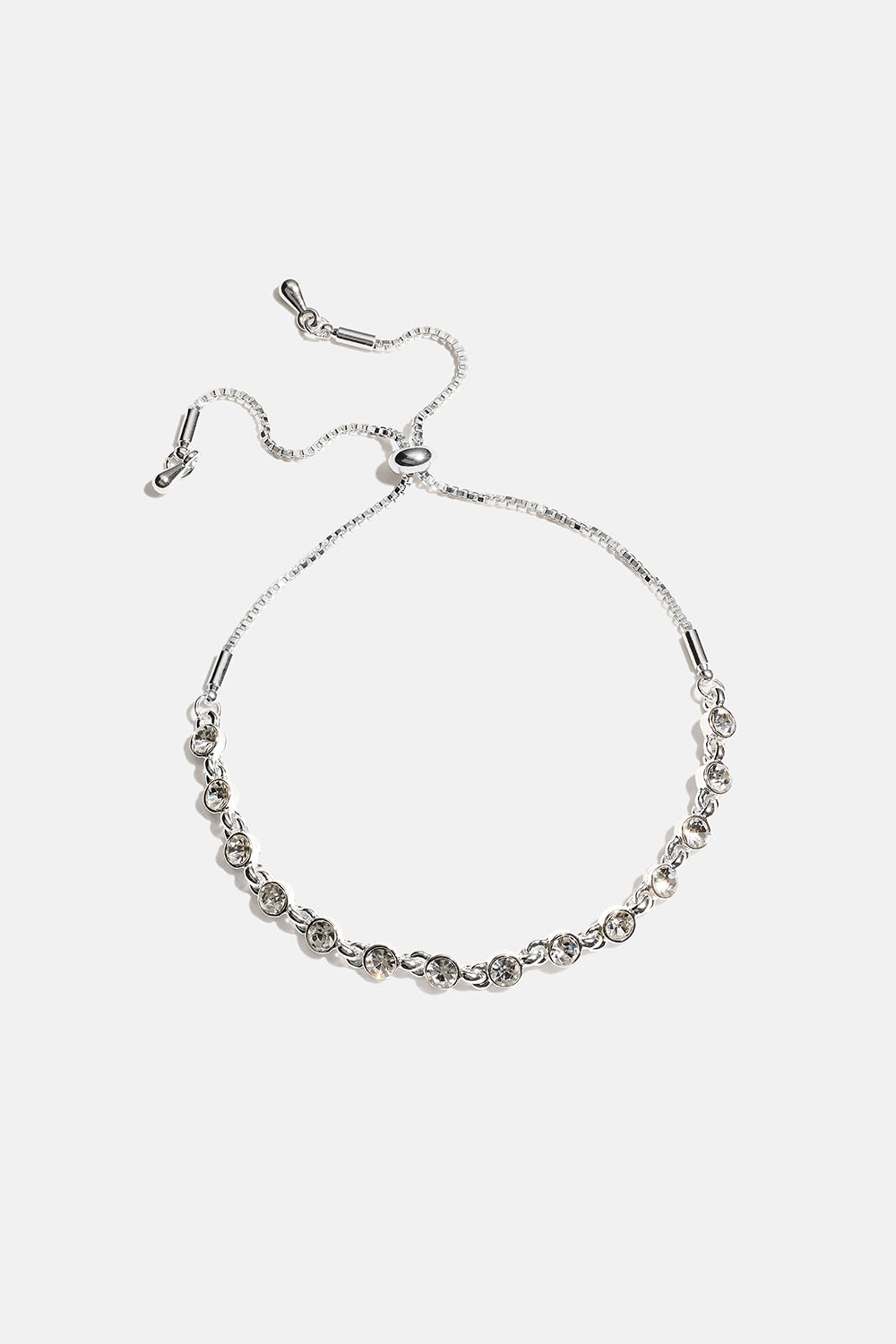 Rannekoru, jossa pieniä pyöreitä lasikiviä ryhmässä Korut / Rannekorut / Strassirannekorut @ Glitter (251002051001)