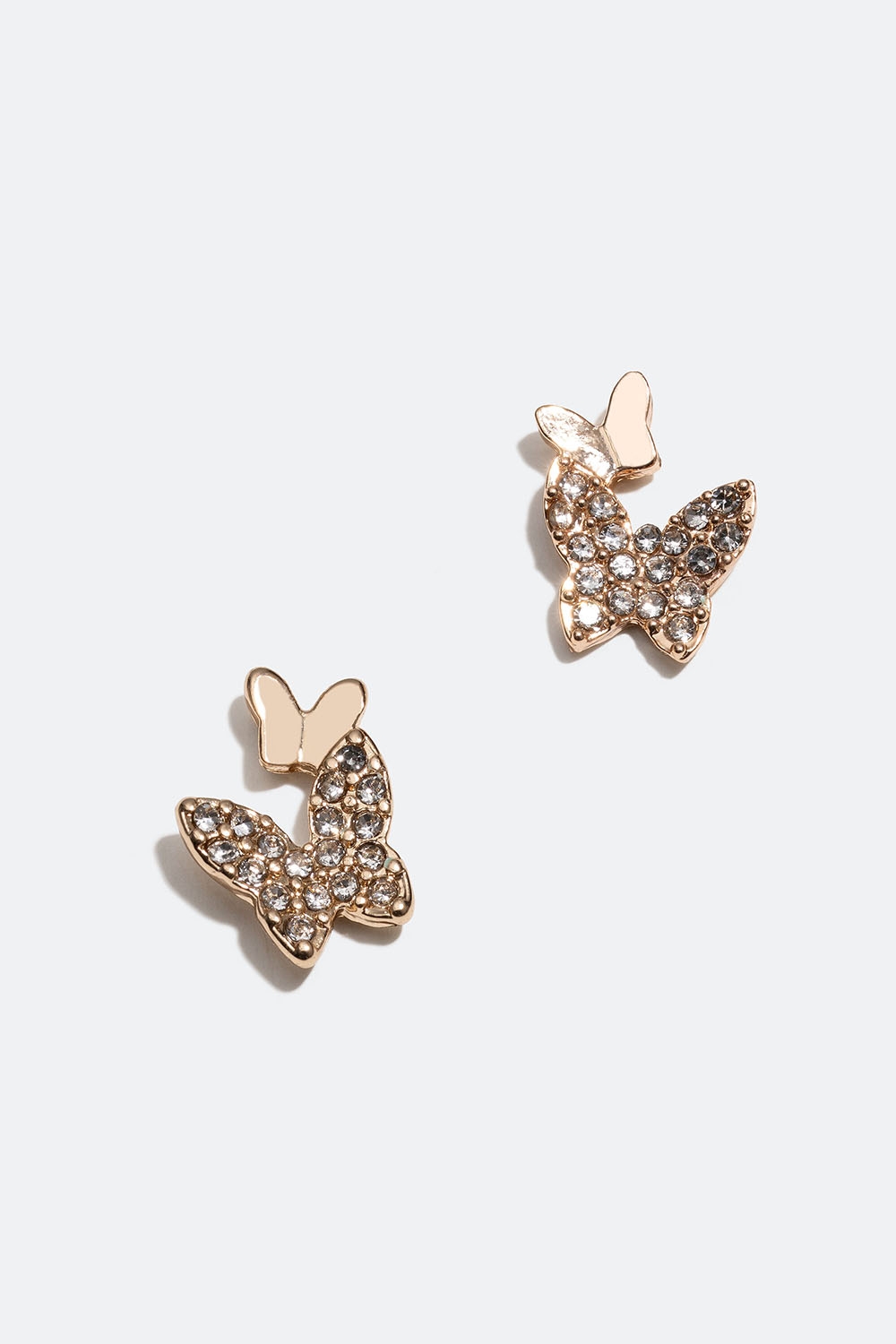 Pienet kullanväriset korvakorut, joissa perhosia ja lasikiviä ryhmässä Korut / Korvakorut / Nappikorvakorut @ Glitter (253005720202)