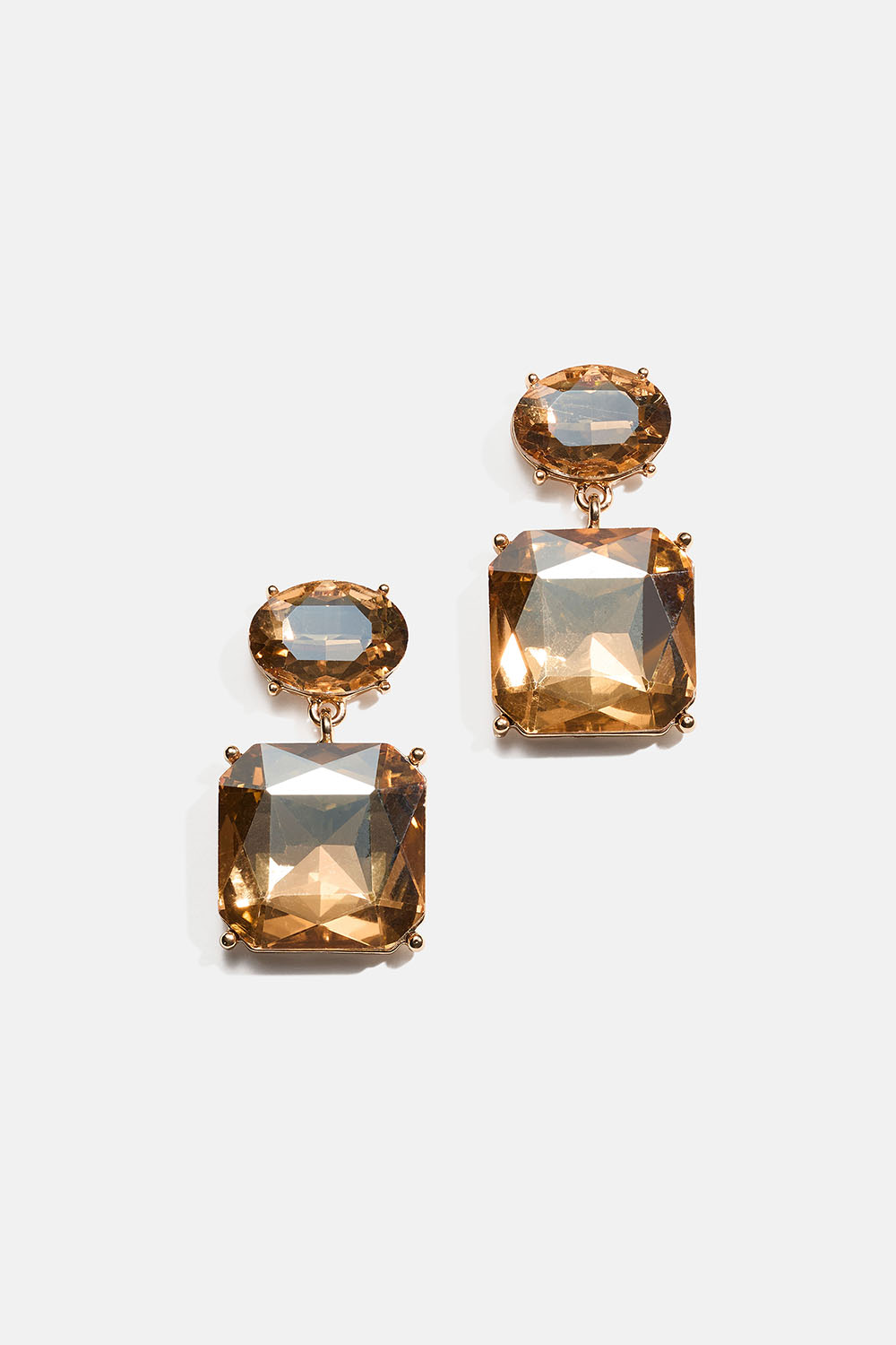Kullanväriset korvakorut, joissa soikeita ja neliönmuotoisia lasikiviä ryhmässä Korut / Korvakorut @ Glitter (253010888300)