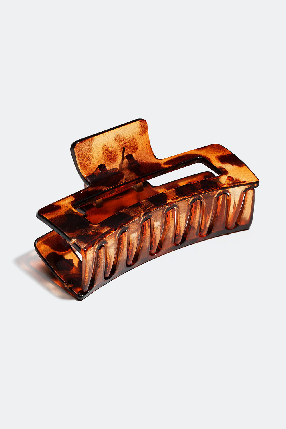 Ruskea meleerattu hiusklipsi