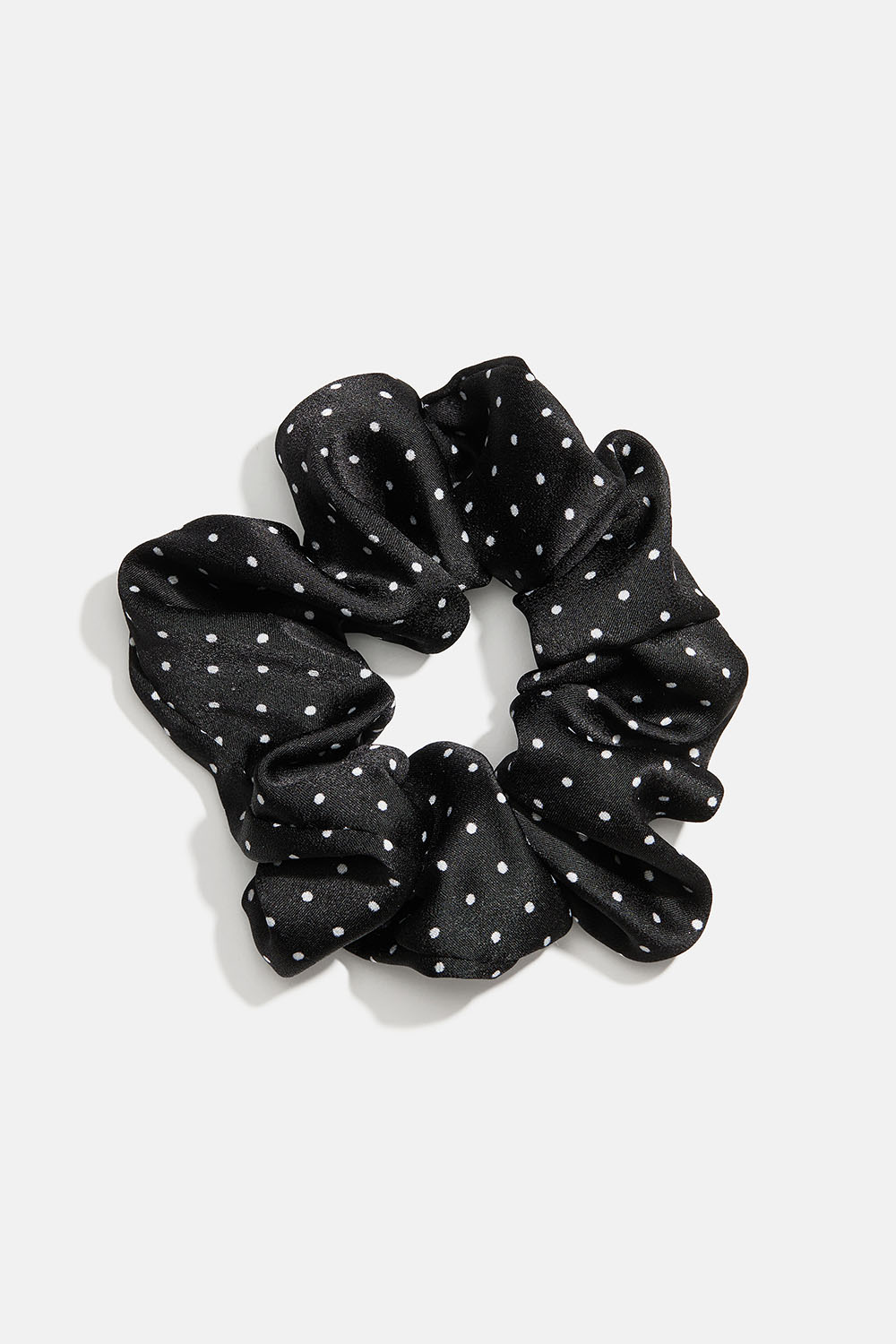 Hiusdonitsi mustaa keinosilkkiä, jossa valkoisia pilkkuja ryhmässä Hiustuotteet / Scrunchie-hiusdonitsit @ Glitter (332001629400)