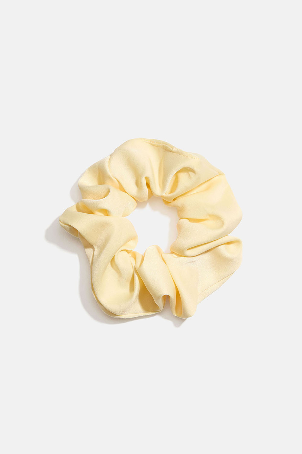 Pieni Keltainen hiusdonitsi keinosilkistä ryhmässä Hiustuotteet / Scrunchie-hiusdonitsit @ Glitter (332001644000)