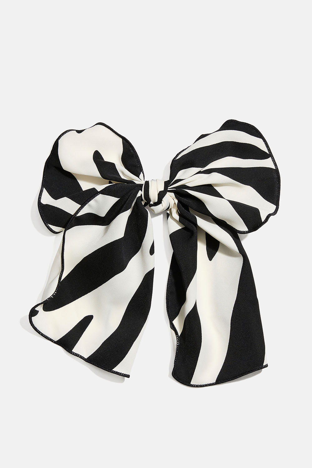 Hiussolki, jossa rusetti seeprakuvioisesta kankaasta ryhmässä Hiustuotteet / Hiuspinnit ja -klipsit / Hiuskoristeet @ Glitter (335002080800)