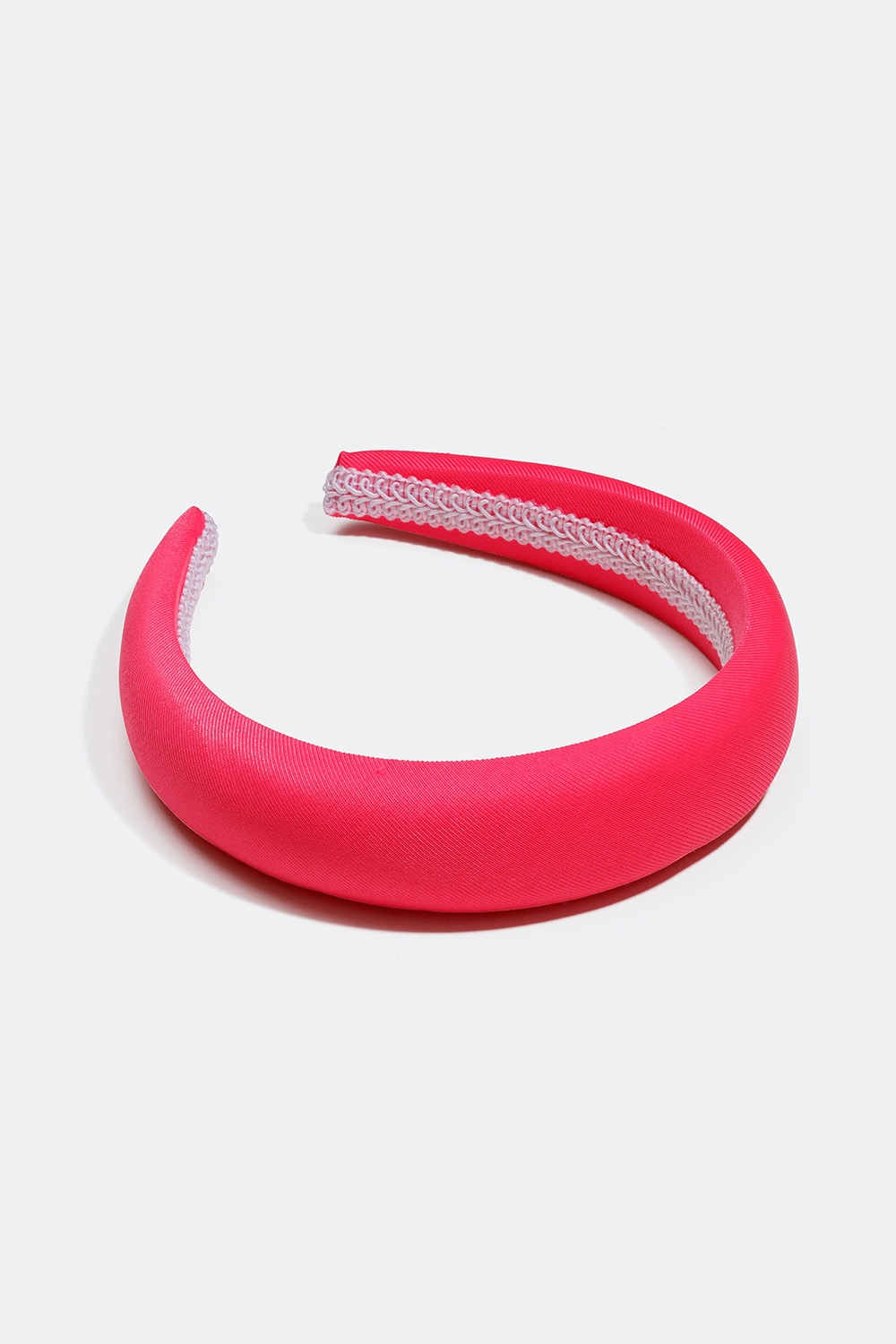 Pehmustettu neonvaaleanpunainen diadeemi ryhmässä Hiustuotteet / Hiuspannat / Leveät @ Glitter (336000465300)