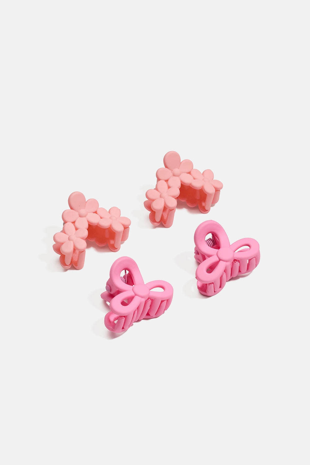 Pienet vaaleanpunaiset hiusklipsit, joissa kukkia ja rusetteja, 4 kpl ryhmässä Lapsille / Lasten hiustuotteet / Lasten hiussoljet @ Glitter (403000459900)