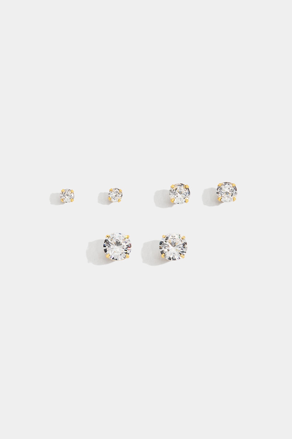 Nappikorvakorut aitoa hopeaa 18k kultauksella ja Cubic Zirconia -kivillä, 3 kpl/pakk. ryhmässä 18 karaatin kullattua hopeaa @ Glitter (553003562002)