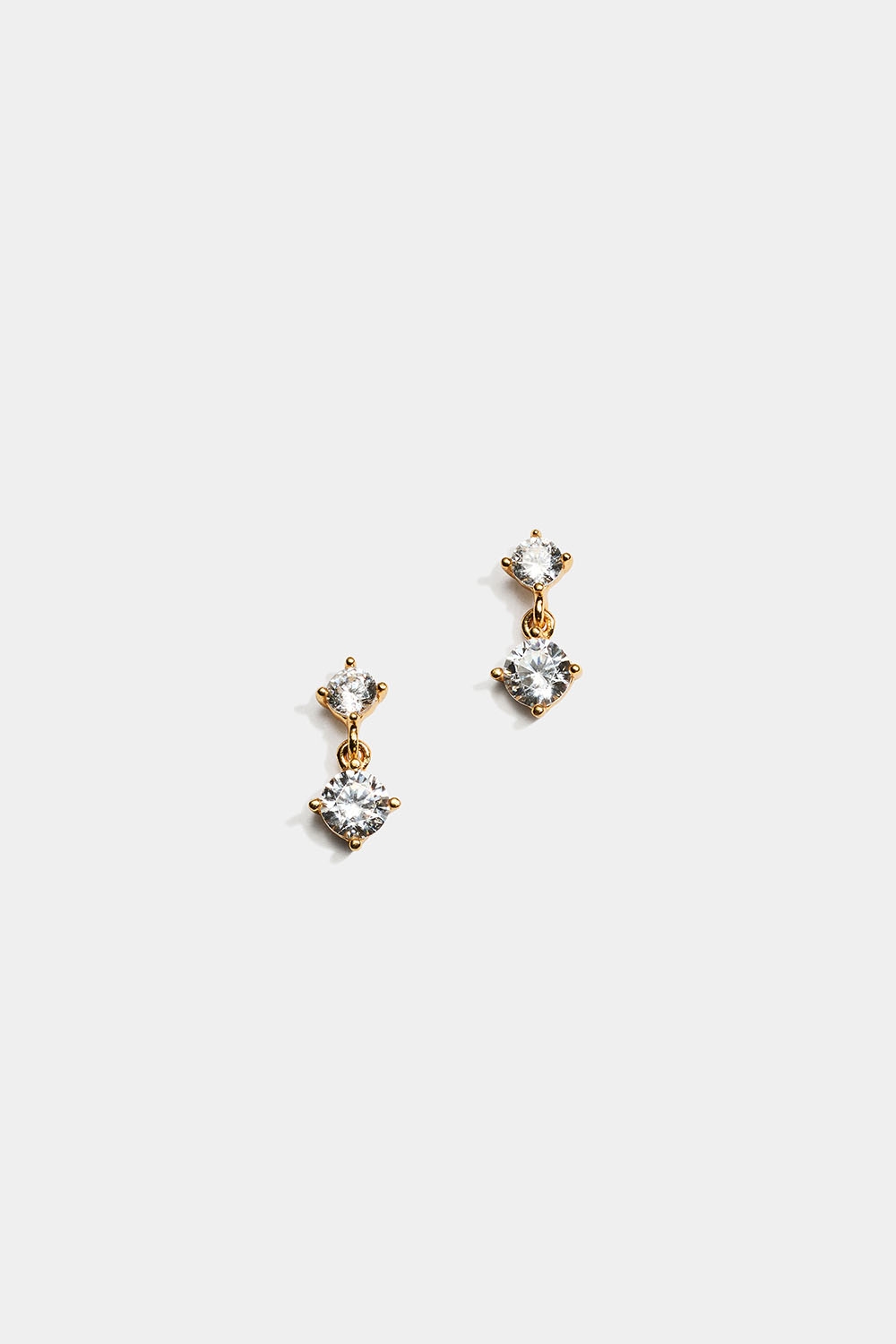 Hopeiset, 18k kullalla kullatut nappikorvakorut, joissa molemmissa kaksi Cubic zirkonia -kiveä ryhmässä Korut / Korvakorut / Nappikorvakorut @ Glitter (553004272002)