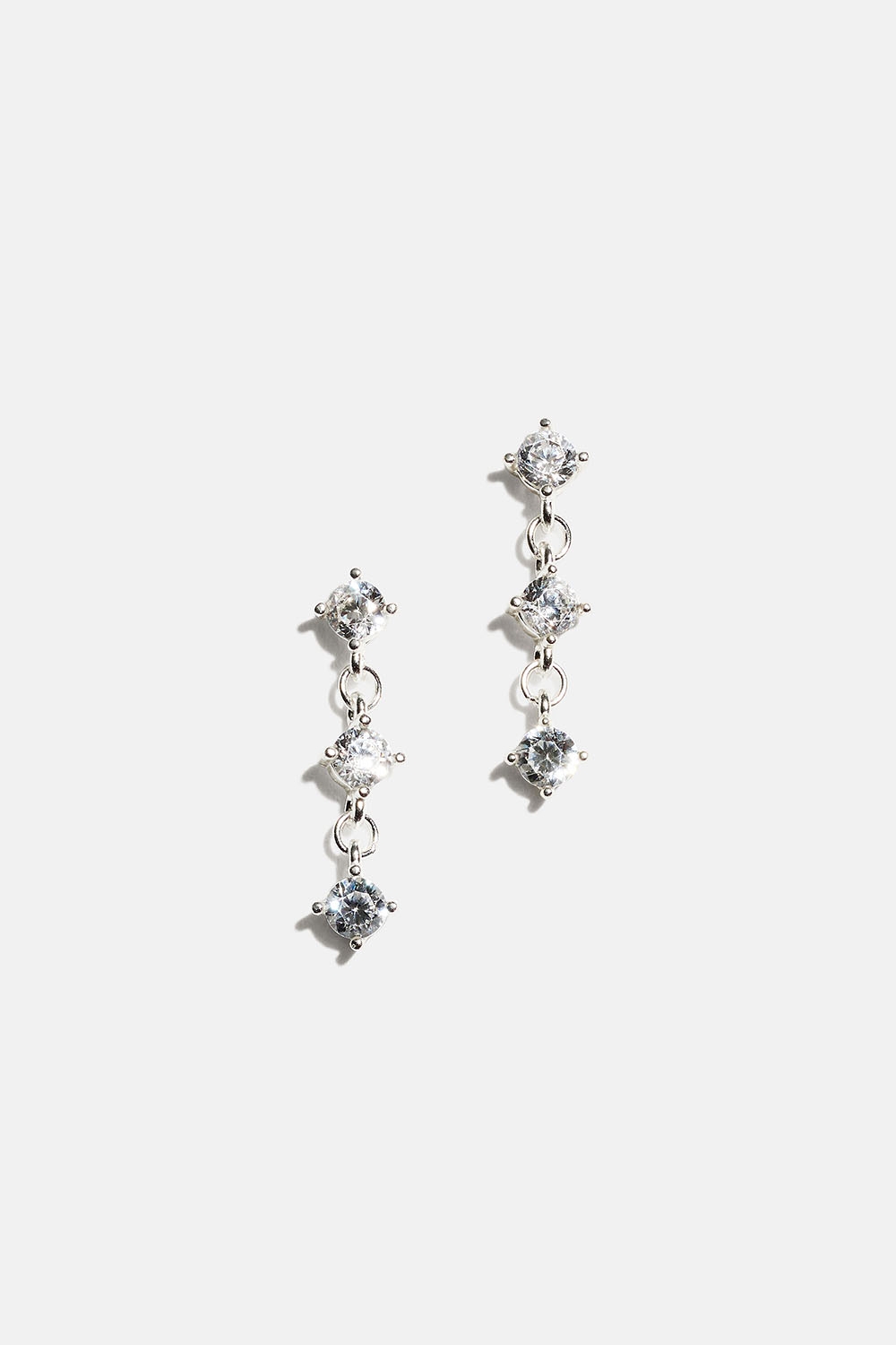 Aidot hopeakorvakorut, joissa on roikkuvia Cubic Zirconia -kiviä. ryhmässä Korut / Korvakorut / Strassikorvakorut @ Glitter (553004881001)