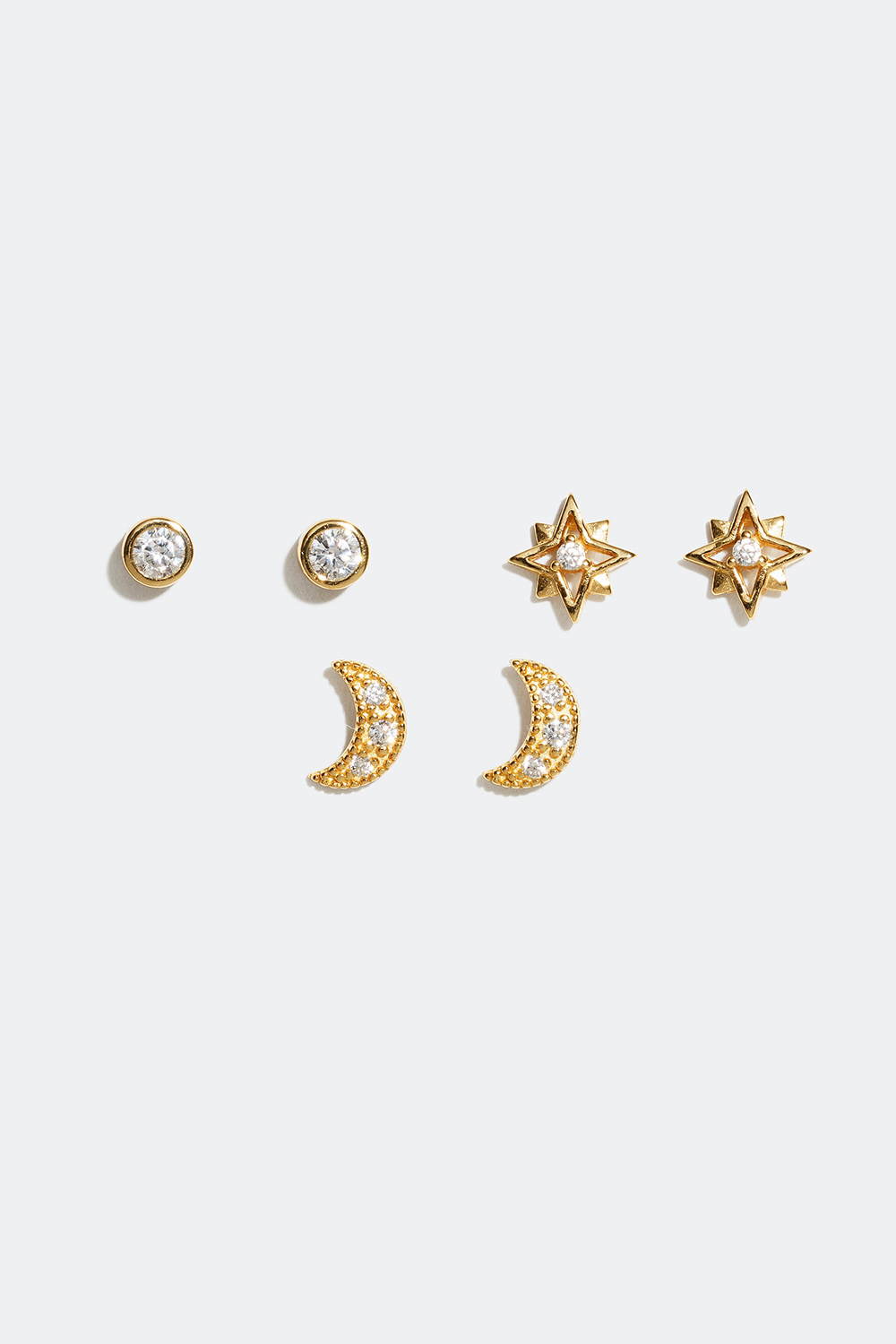 Nappikorvakorut eri muotoilulla, kuu ja tähti, 18 karaatin kultaus, 3 kpl