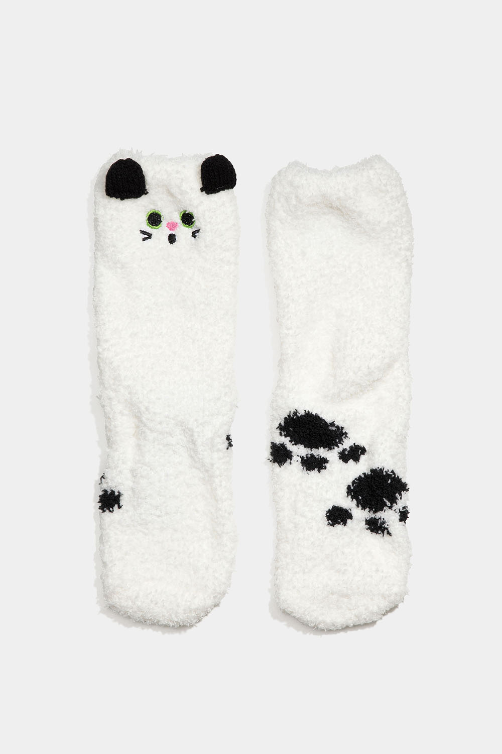 Pörröiset sukat, joissa kissa