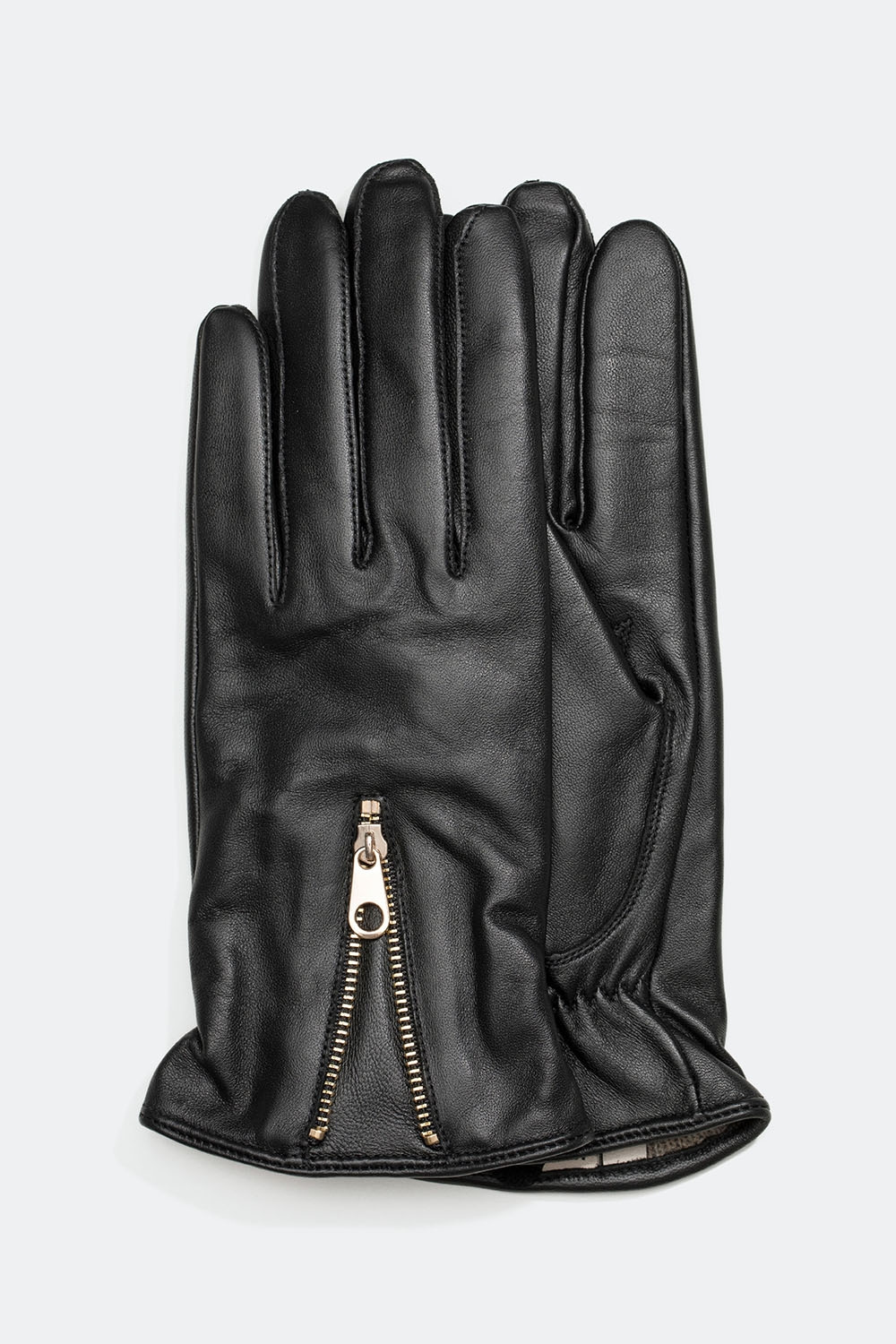 Mustat nahkakäsineet, joissa on kullanvärinen vetoketju