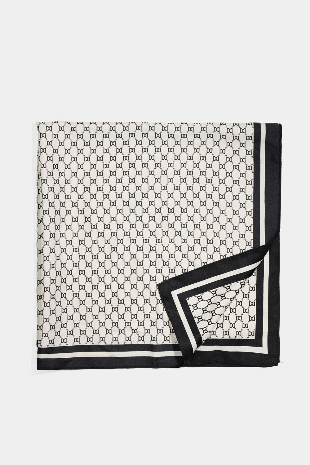 Keinosilkkinen huivi valkealla kuvioinnilla