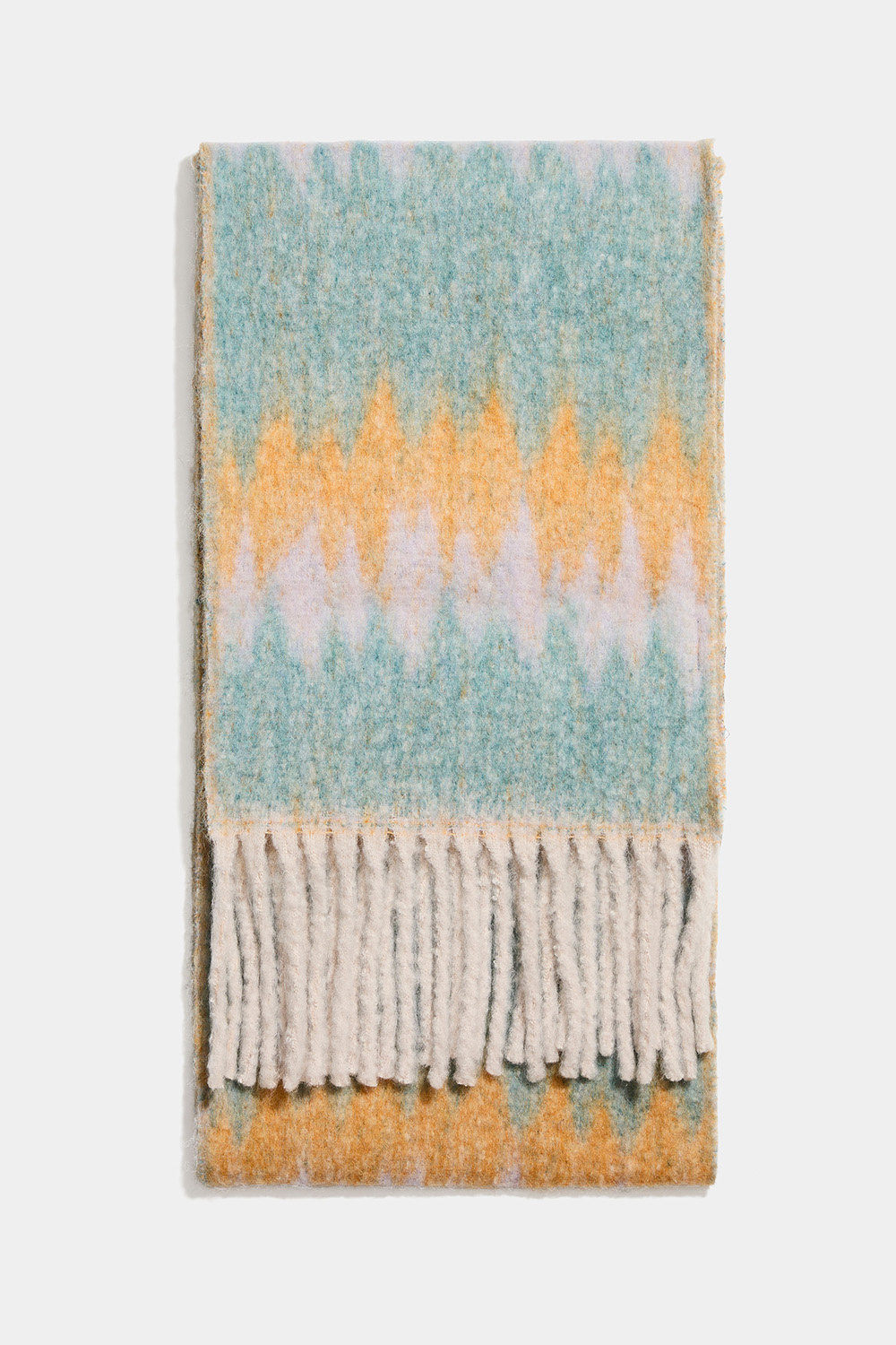 Turkoosin ja oranssin värinen huivi, jossa siksak-kuvio