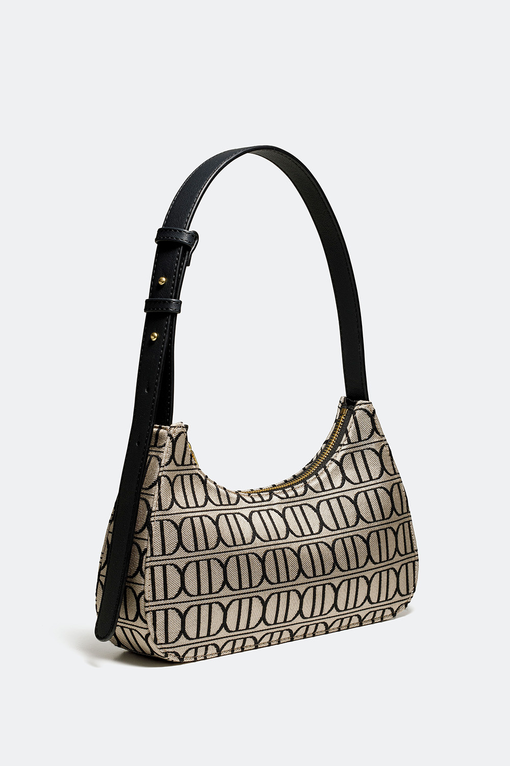 Beige jakardikudottu baguette-laukku