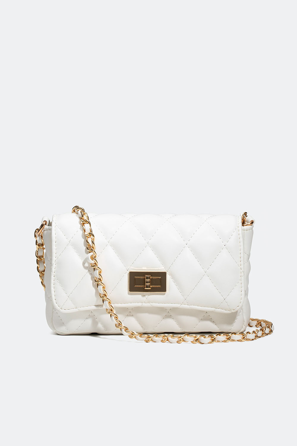 Valkoinen tikattu olkalaukku