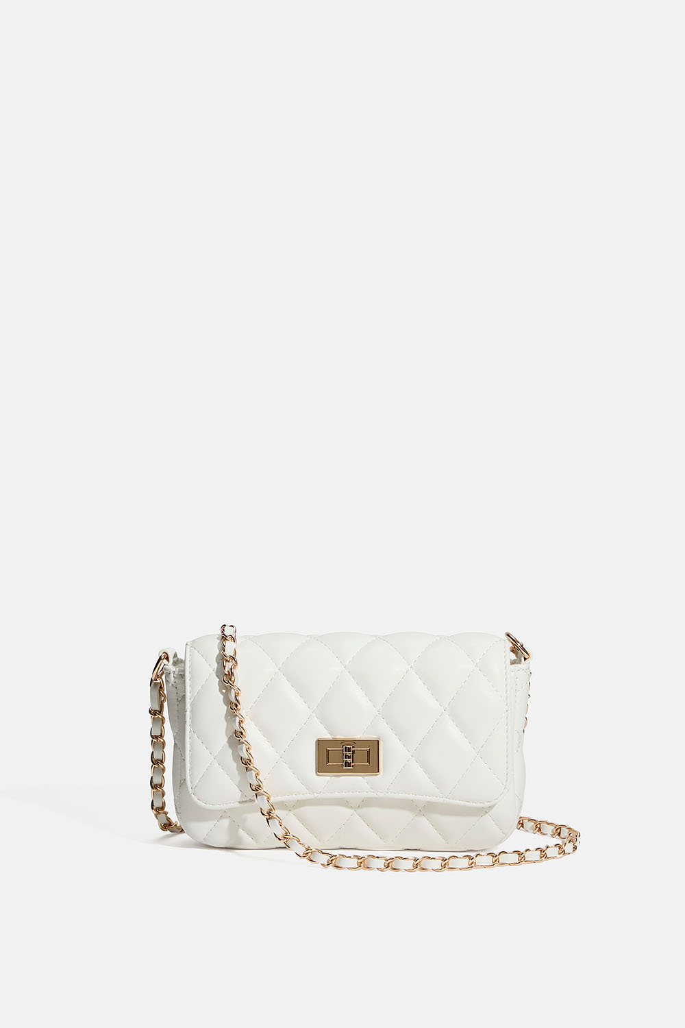 Valkoinen tikattu olkalaukku