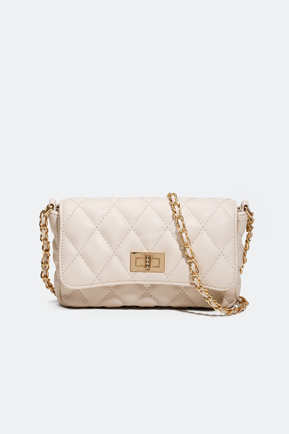 Beige tikattu olkalaukku