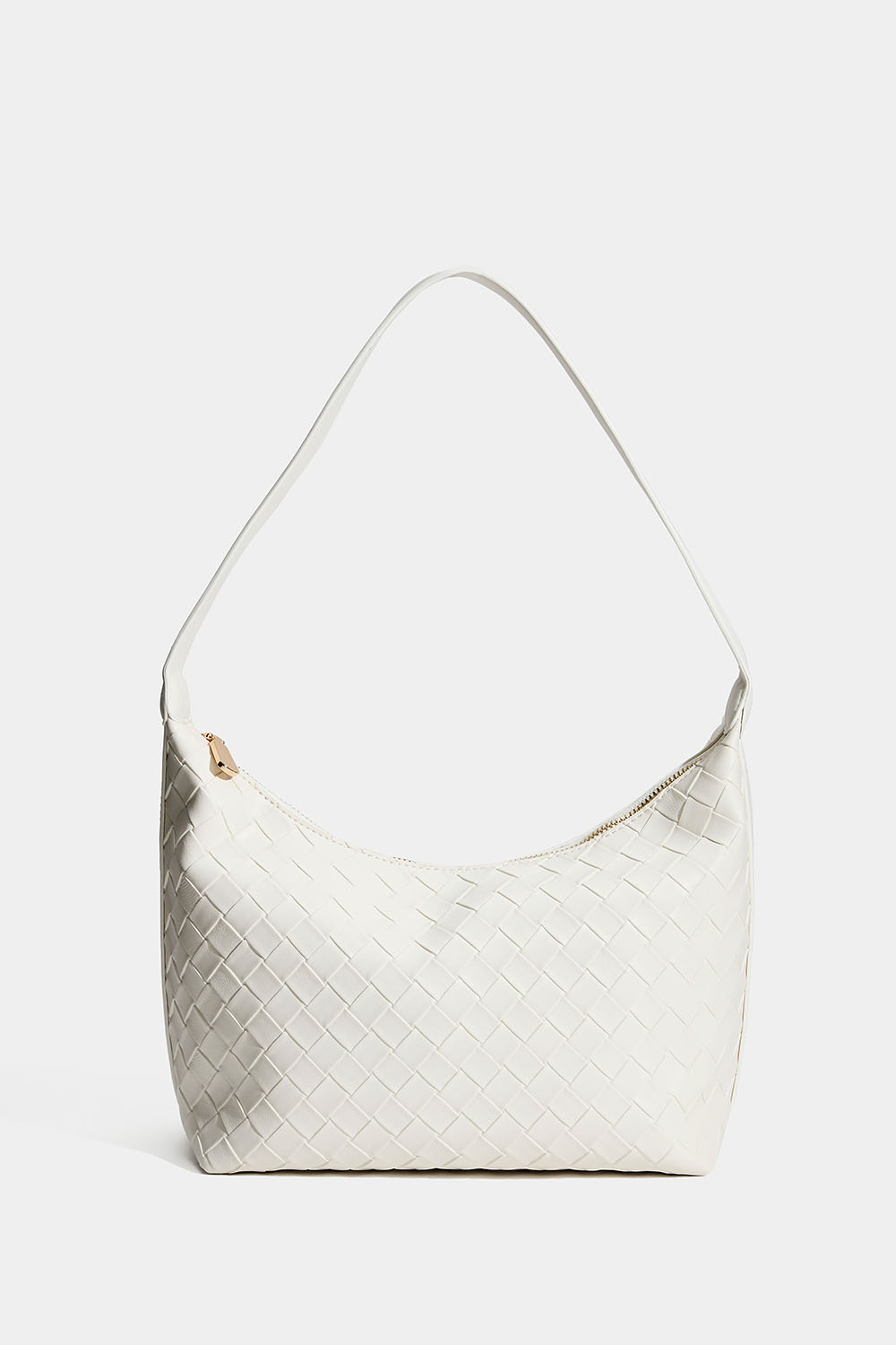 Valkoinen käsilaukku, jossa punottu pinta