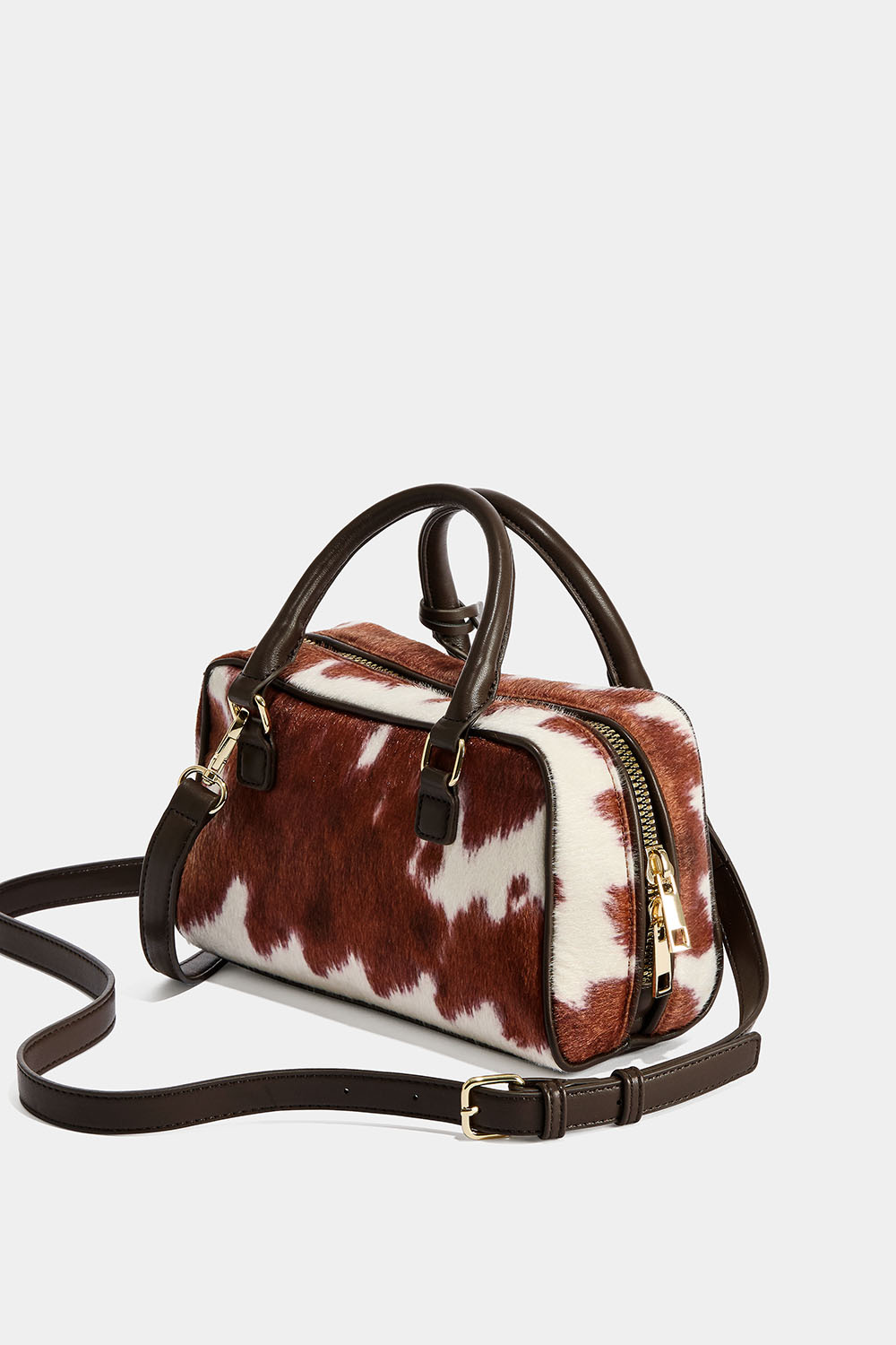 Suorakulmainen laukku lehmännahkajäljitelmästä