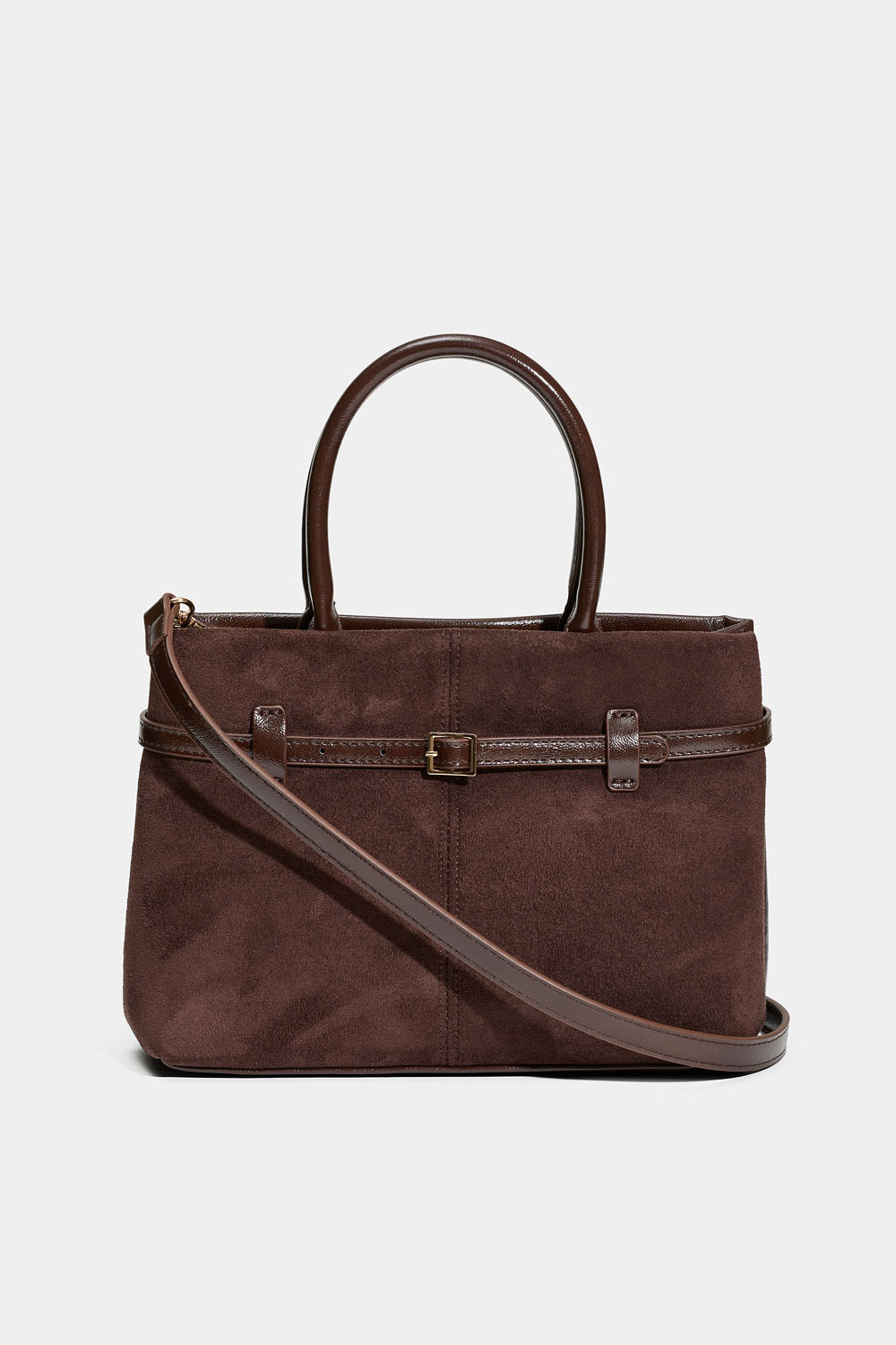 Pieni ruskea laukku, jossa vyöyksityiskohta