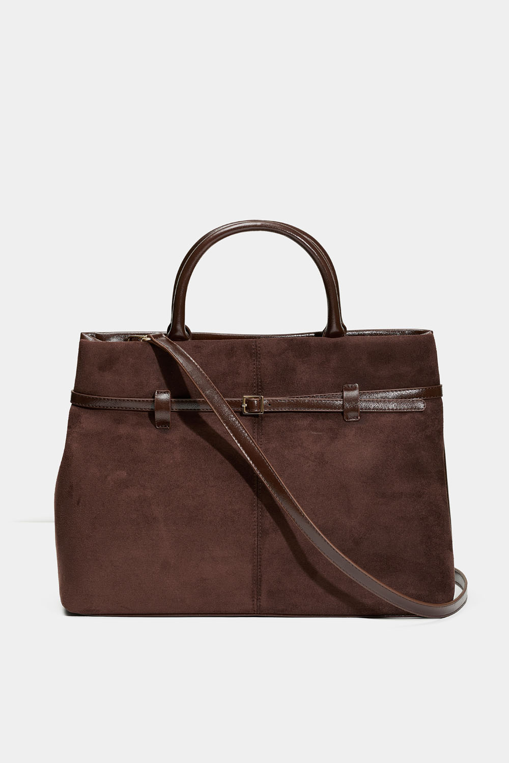 Ruskea laukku, jossa vyöyksityiskohta