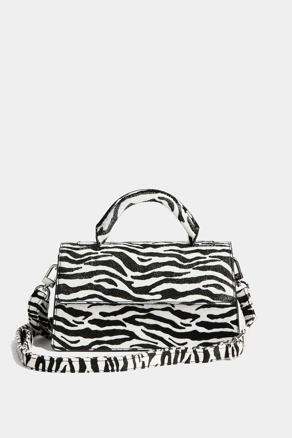 Pieni seeprakuvioinen suorakulmainen laukku