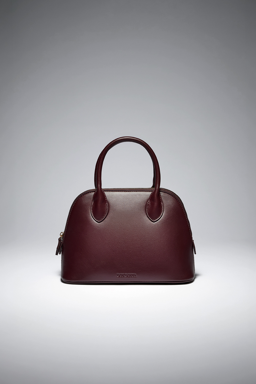 Viininpunainen keilalaukku