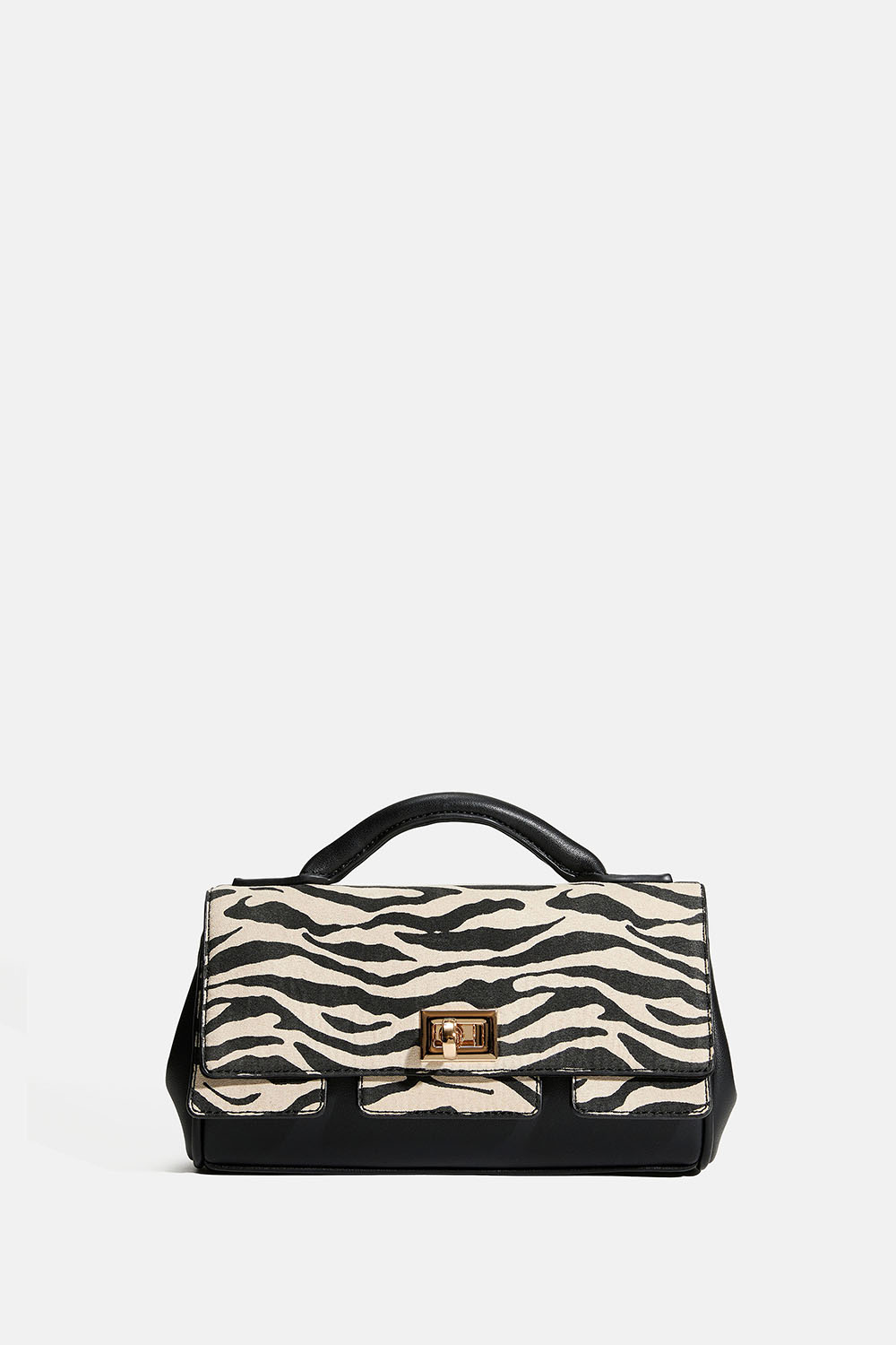 Pieni musta laukku, jossa on seeprakuvio ja olkahihna