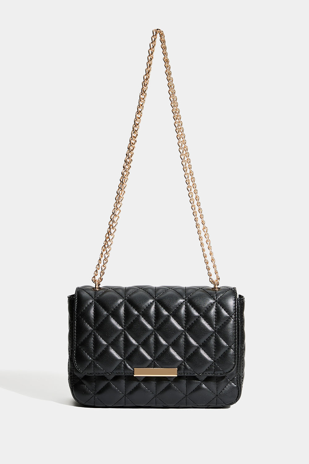 Musta laukku, jossa on tikattu malli ja kullanvärinen olkahihna.