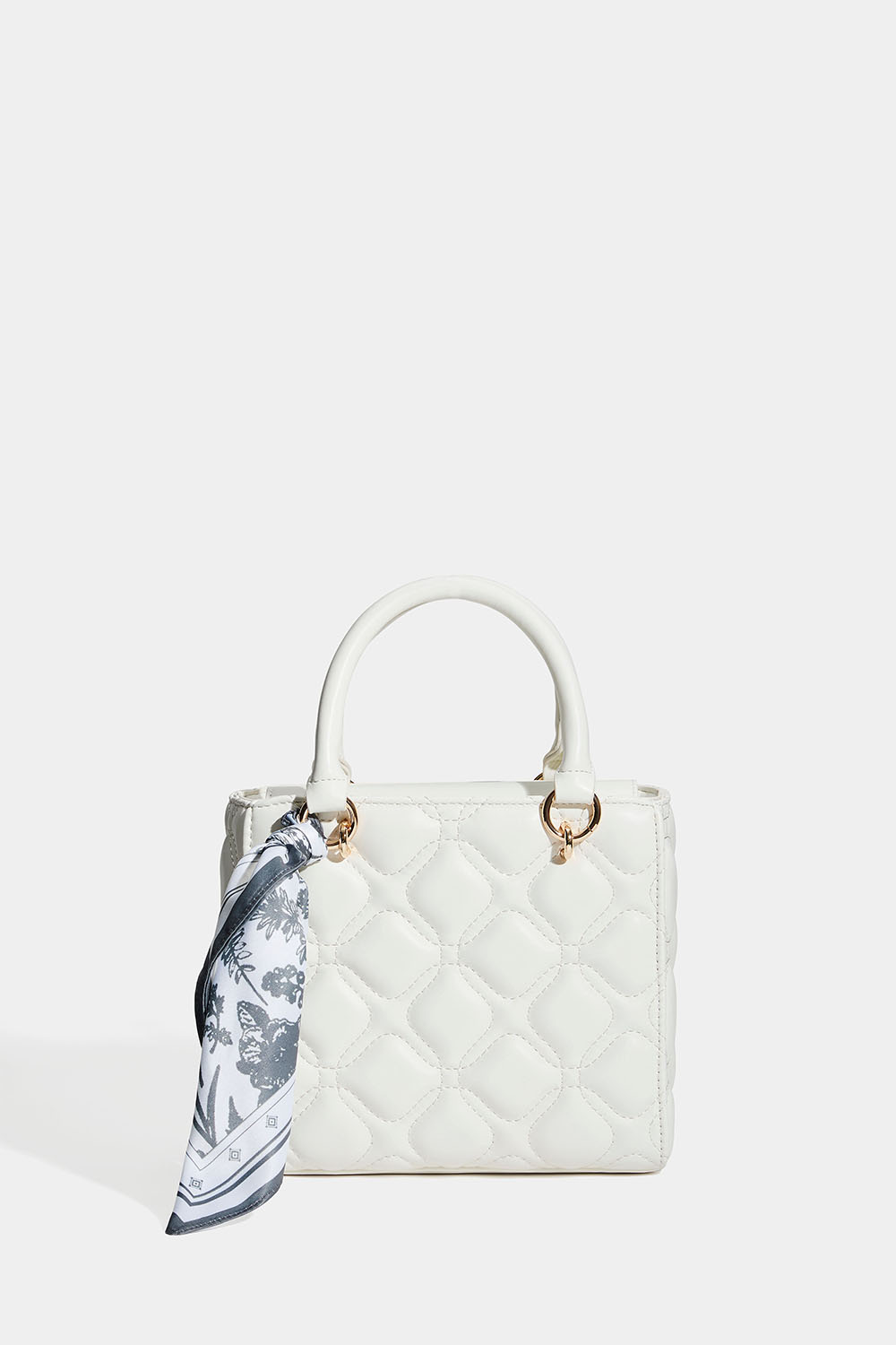 Vaaleanpunainen tikattu laukku ja huivi