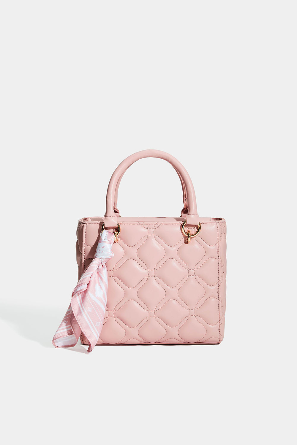 Vaaleanpunainen tikattu laukku ja huivi