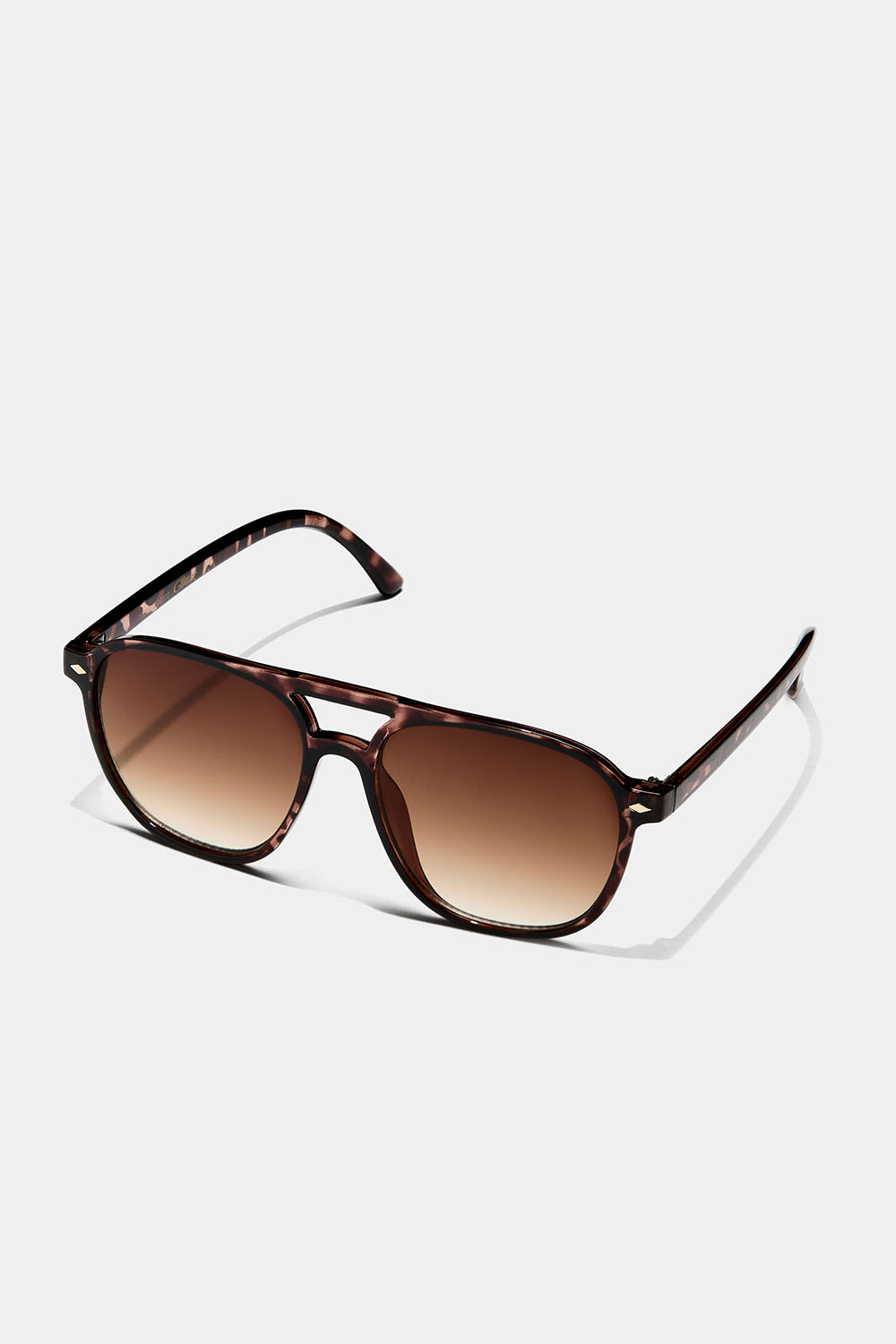 Kilpikonnakuvioiset aurinkolasit kaksinkertaisella nenäntukivarrella