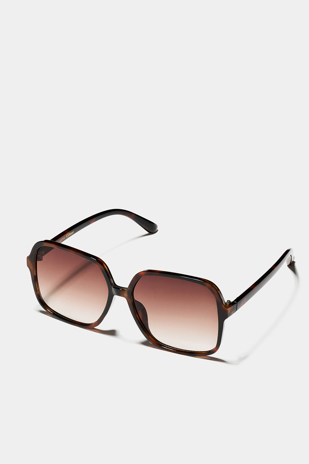 Neliömäiset, ylisuuret kilpikonnakuvioiset aurinkolasit