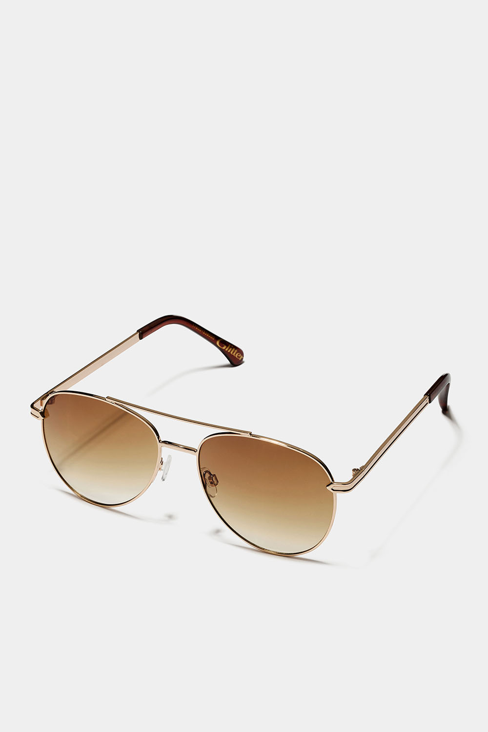 Klassiset pilottiaurinkolasit ruskeilla sävytetyillä linsseillä