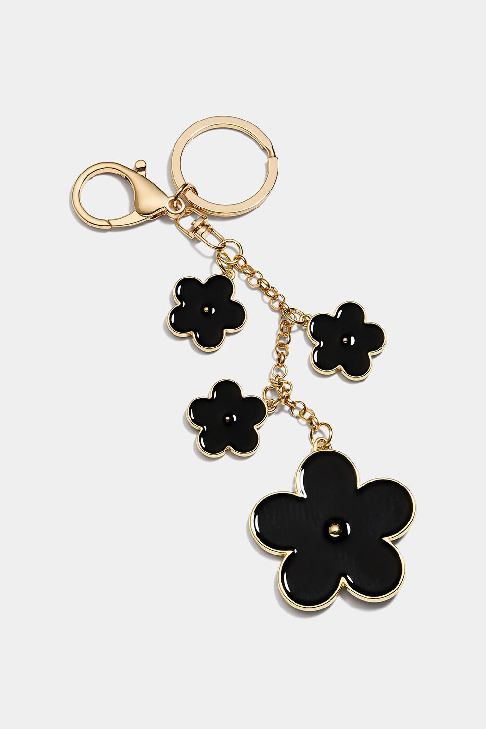 Laukkukoriste mustalla kukalla