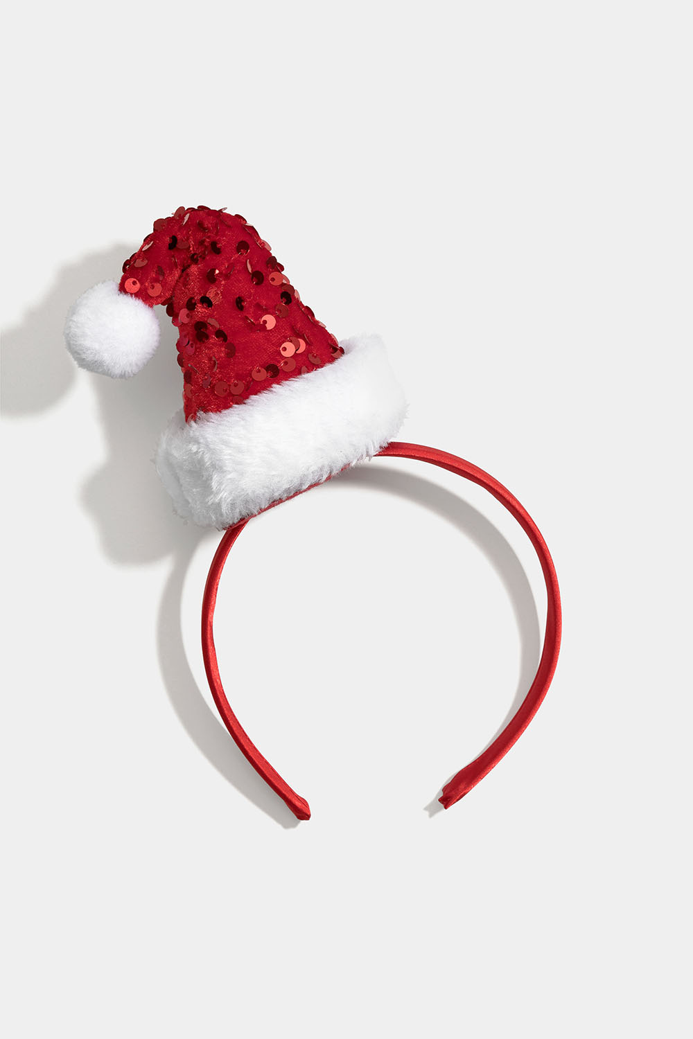 Hiuspanta tonttulakilla sametista ja paljeteista