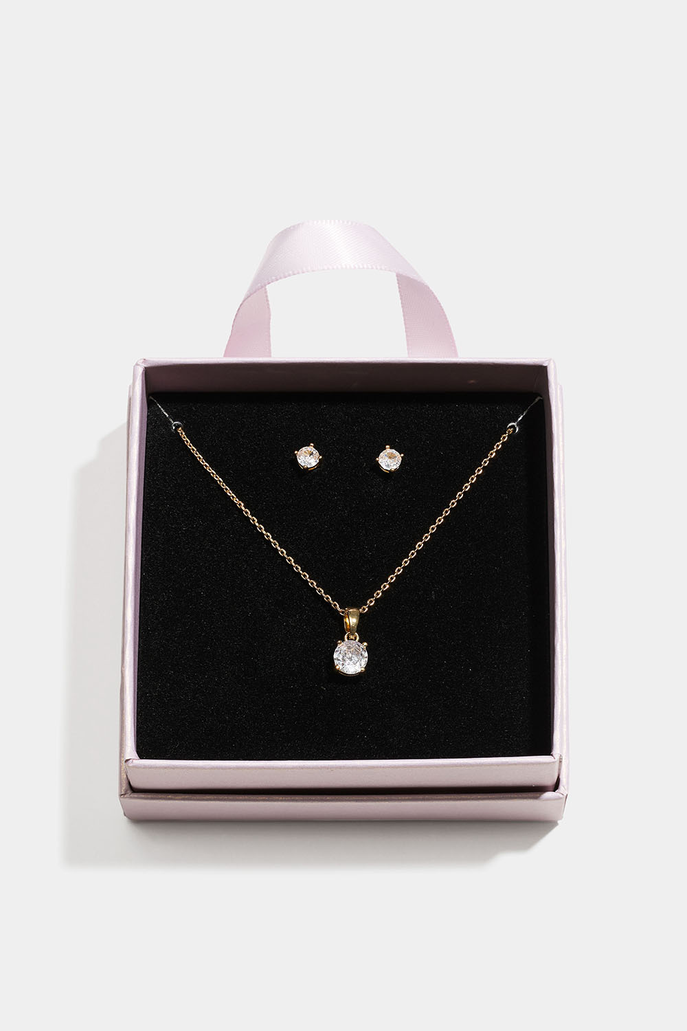 Kullanvärinen korusetti lasikivillä lahjapakkauksessa