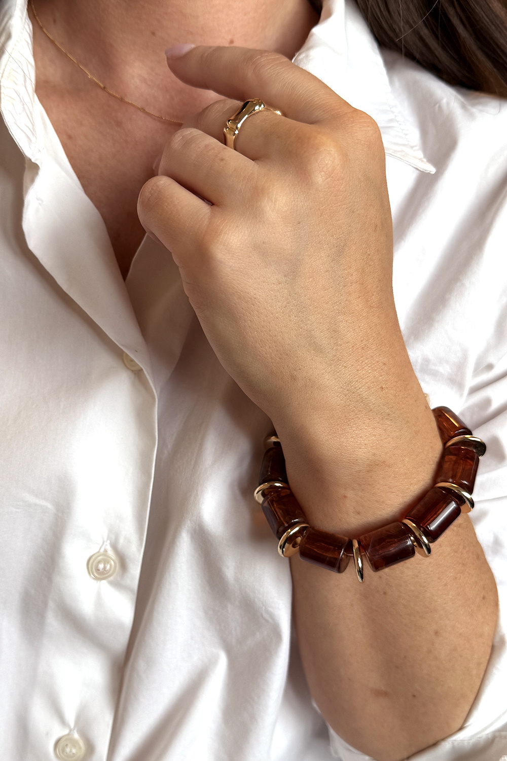 Rannekoru meripihkajäljitelmästä