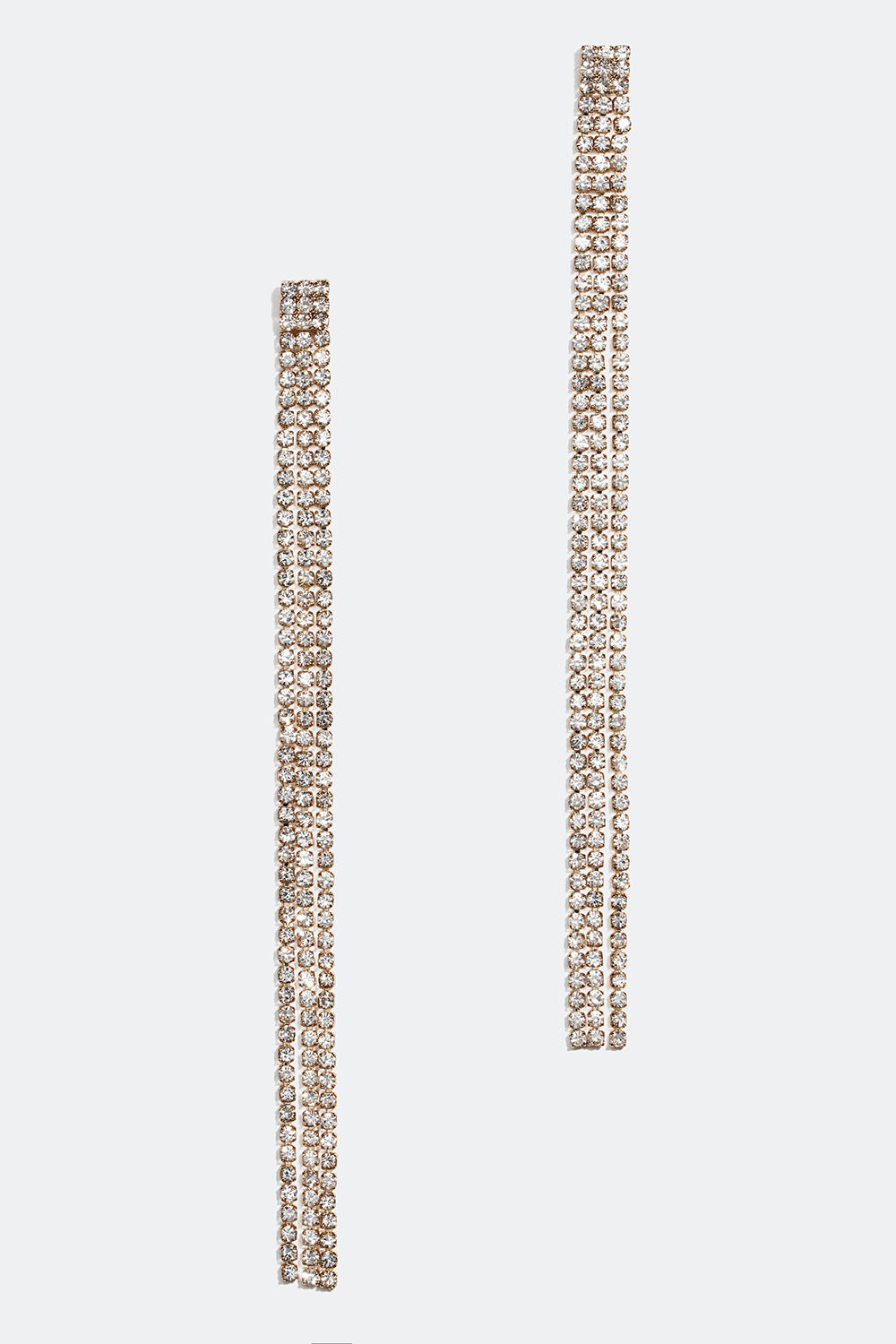 Kullanväriset korvakorut, joissa kolme strassilenkkiä