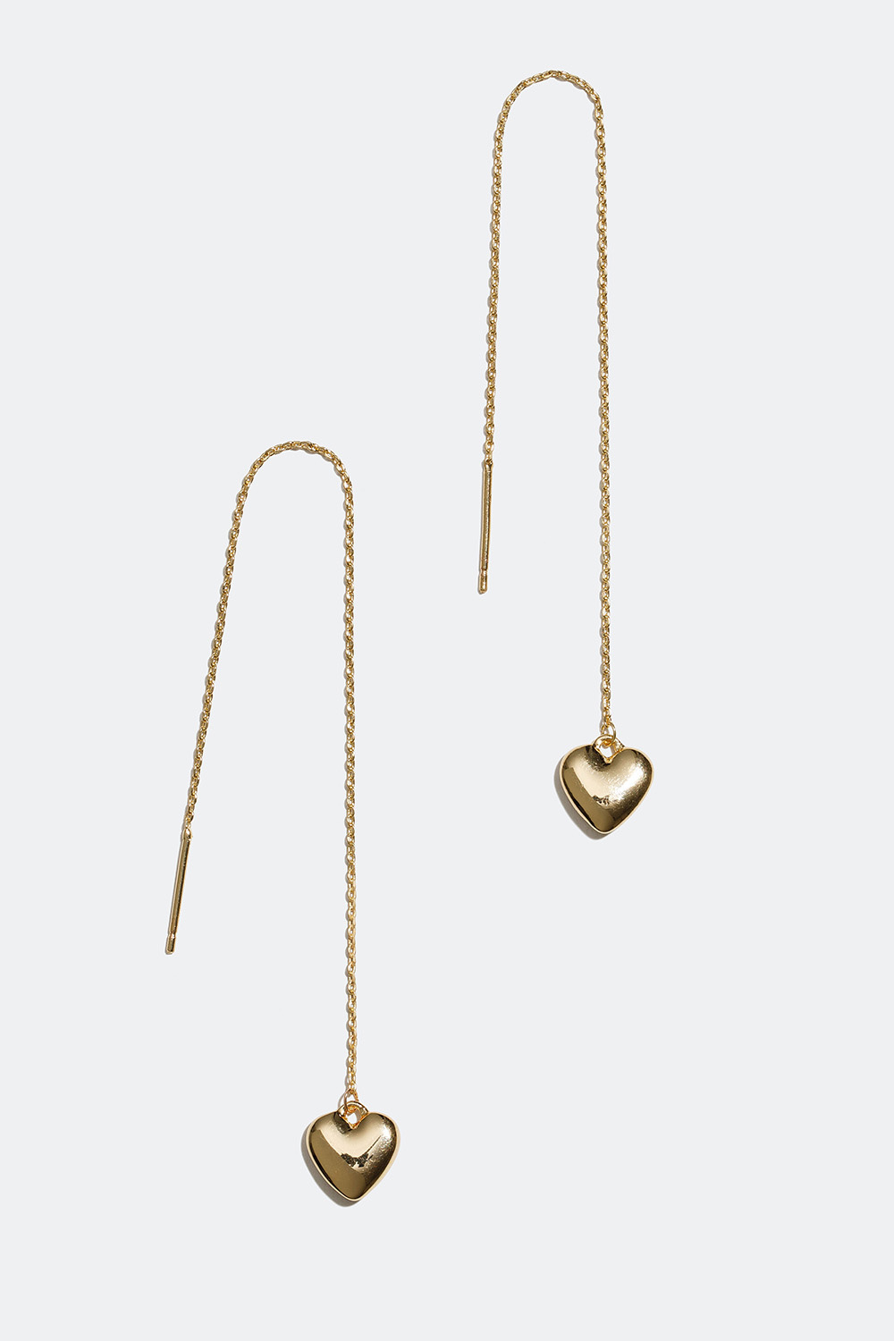 Kullanväriset ketjukorvakorut, joissa sydämiä