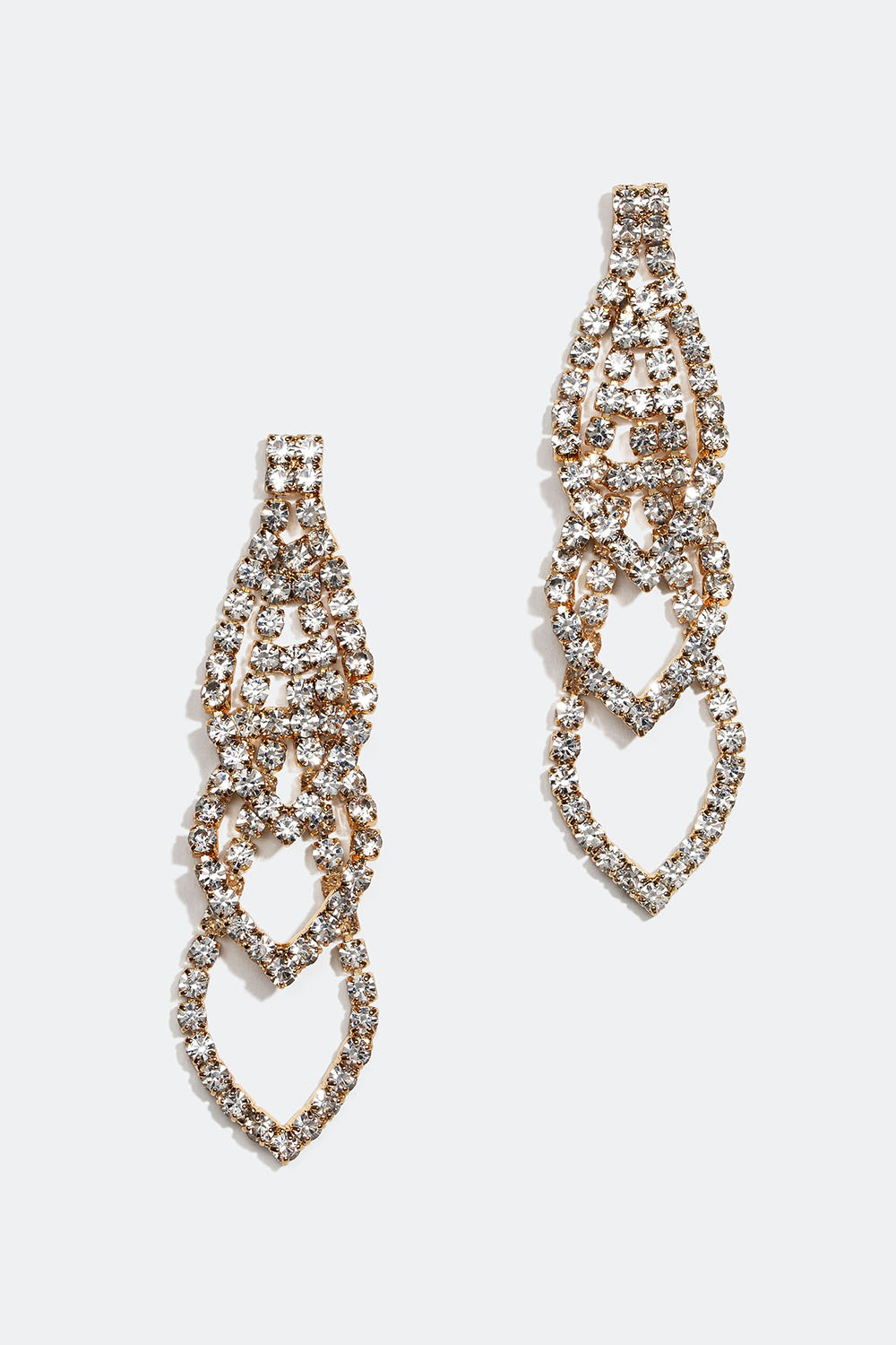 Kullanväriset strassikorvakorut, joissa on kolme koristetta