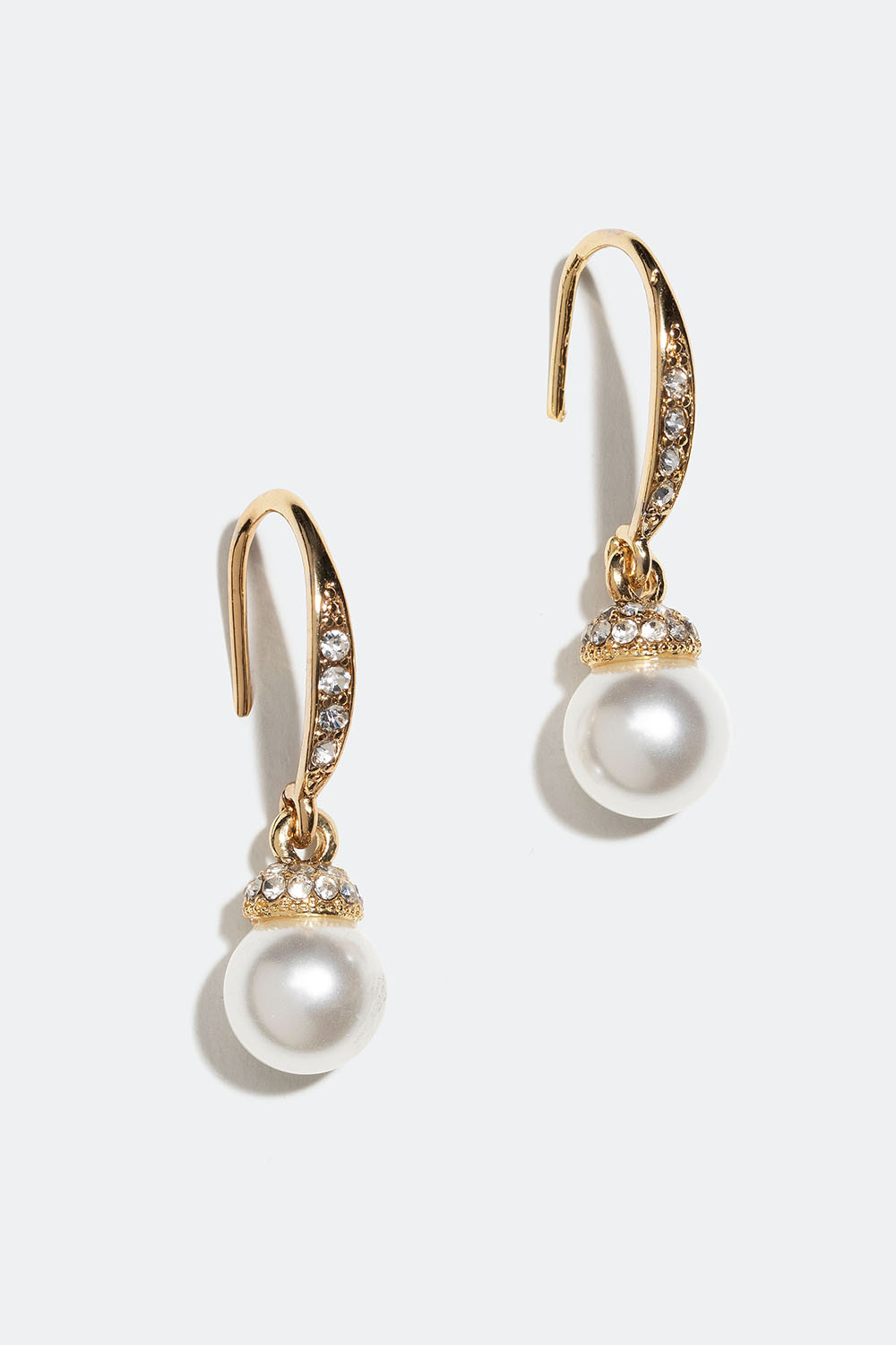 Kullanväriset korvakorut, joissa on lasikiviä ja lasihelmiä