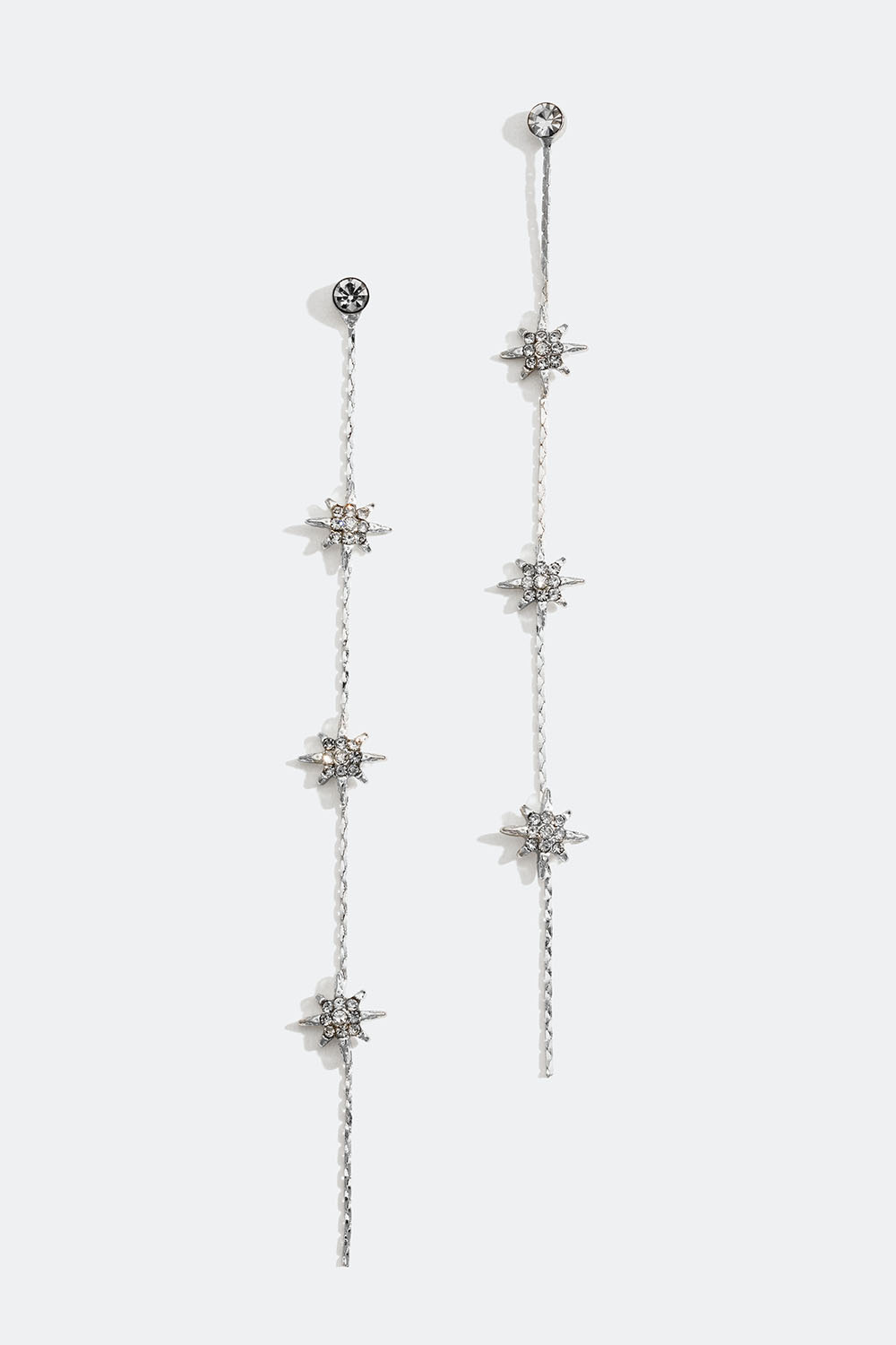 Pitkät ketjukorvakorut, joissa tähtiä ja lasikiviä