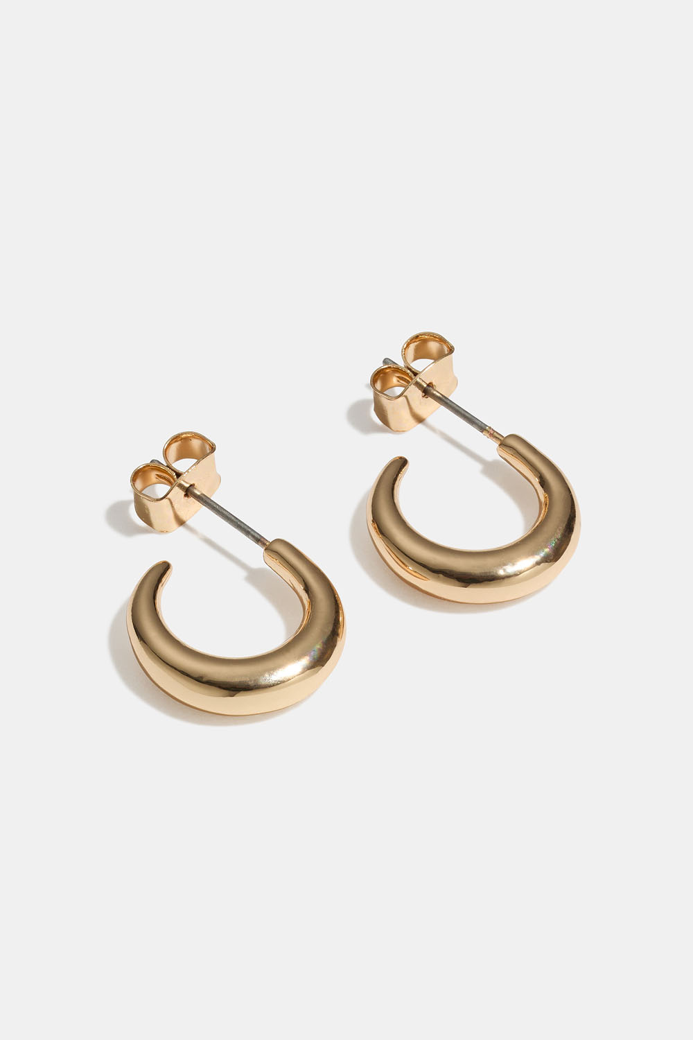 Pienet kullanväriset, pyöristetyt korvarenkaat