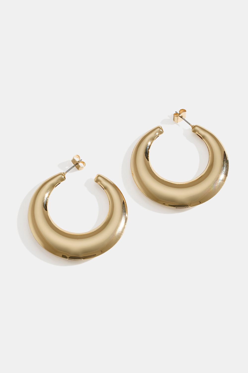 Kullanväriset renkaat, joissa pyöristetyt reunat