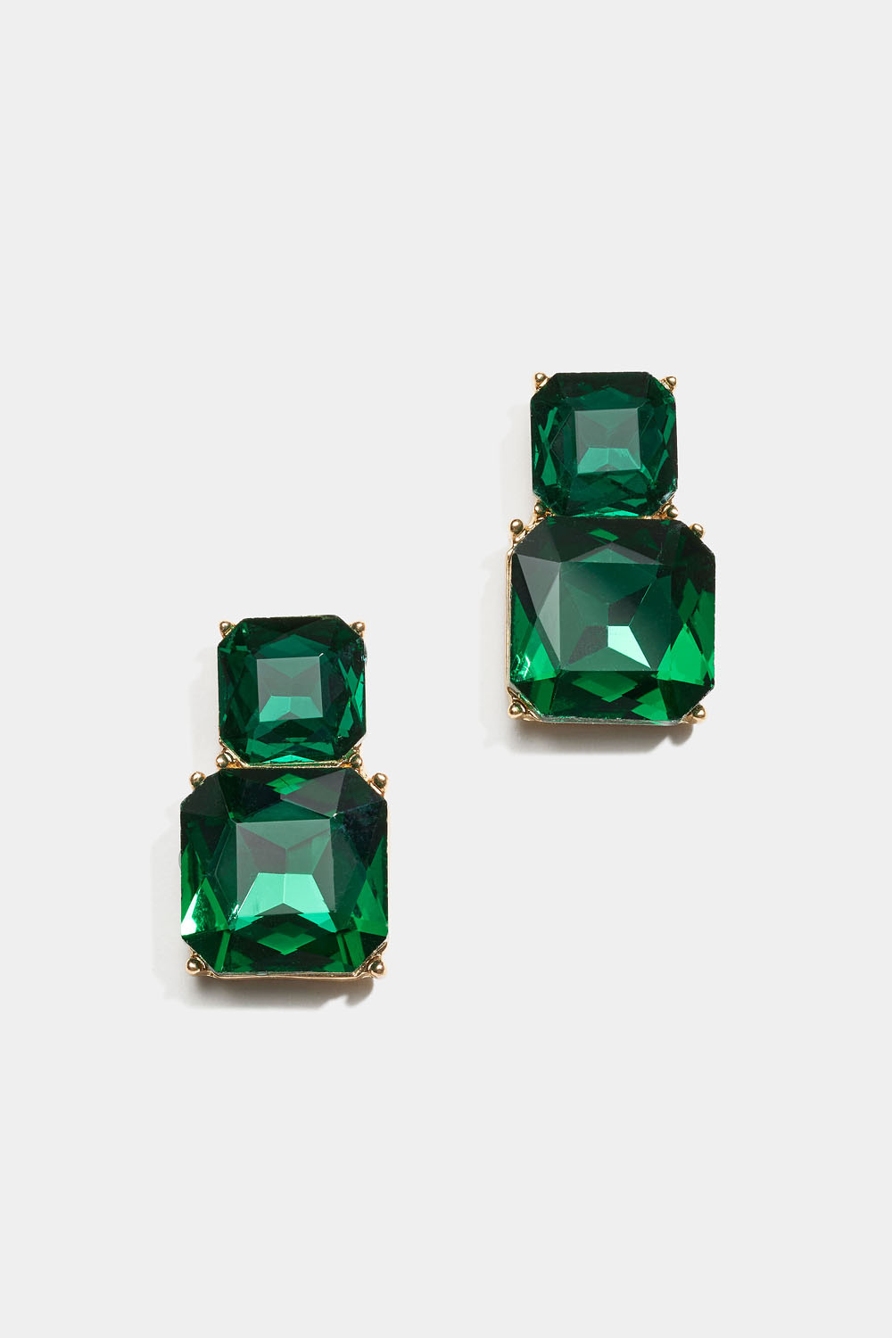 Korvakorut, joissa kaksi neliönmuotoista vihreää lasikiveä