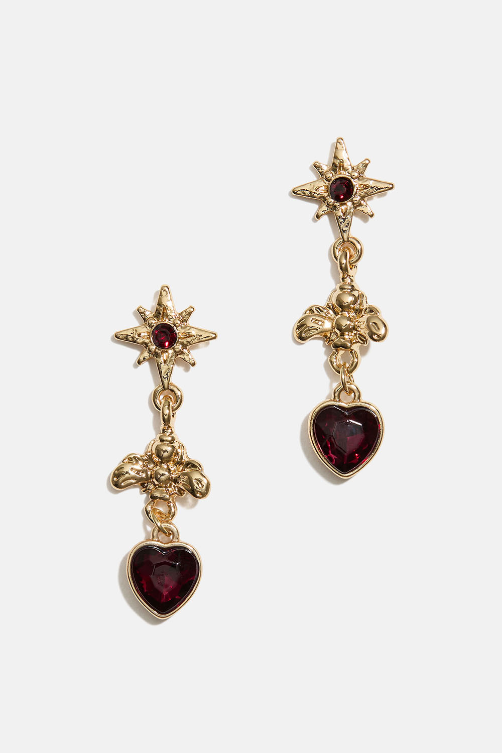 Korvakorut, joissa on mehiläisiä ja punaisia sydämiä