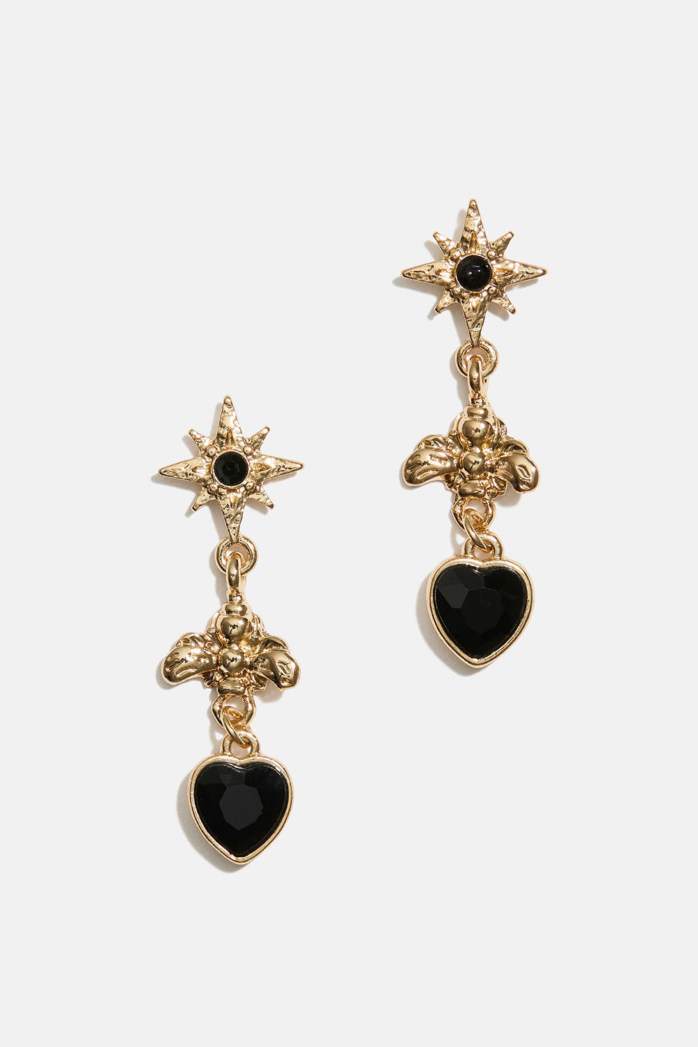 Korvakorut, joissa on mehiläisiä ja mustia sydämiä